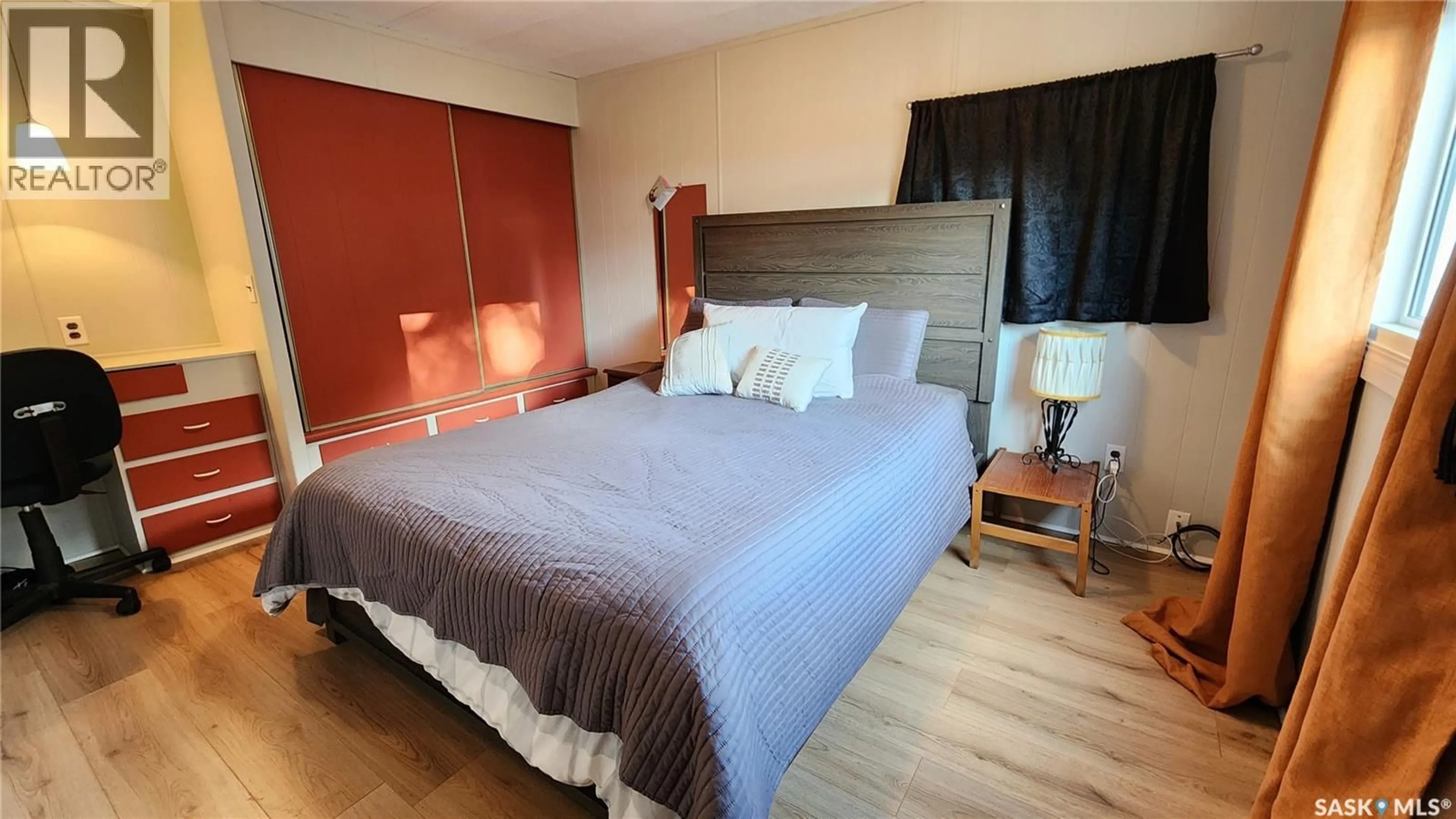 Bedroom with bed, wood/laminate floor for 341 30TH STREET, Battleford Saskatchewan S0M0E0