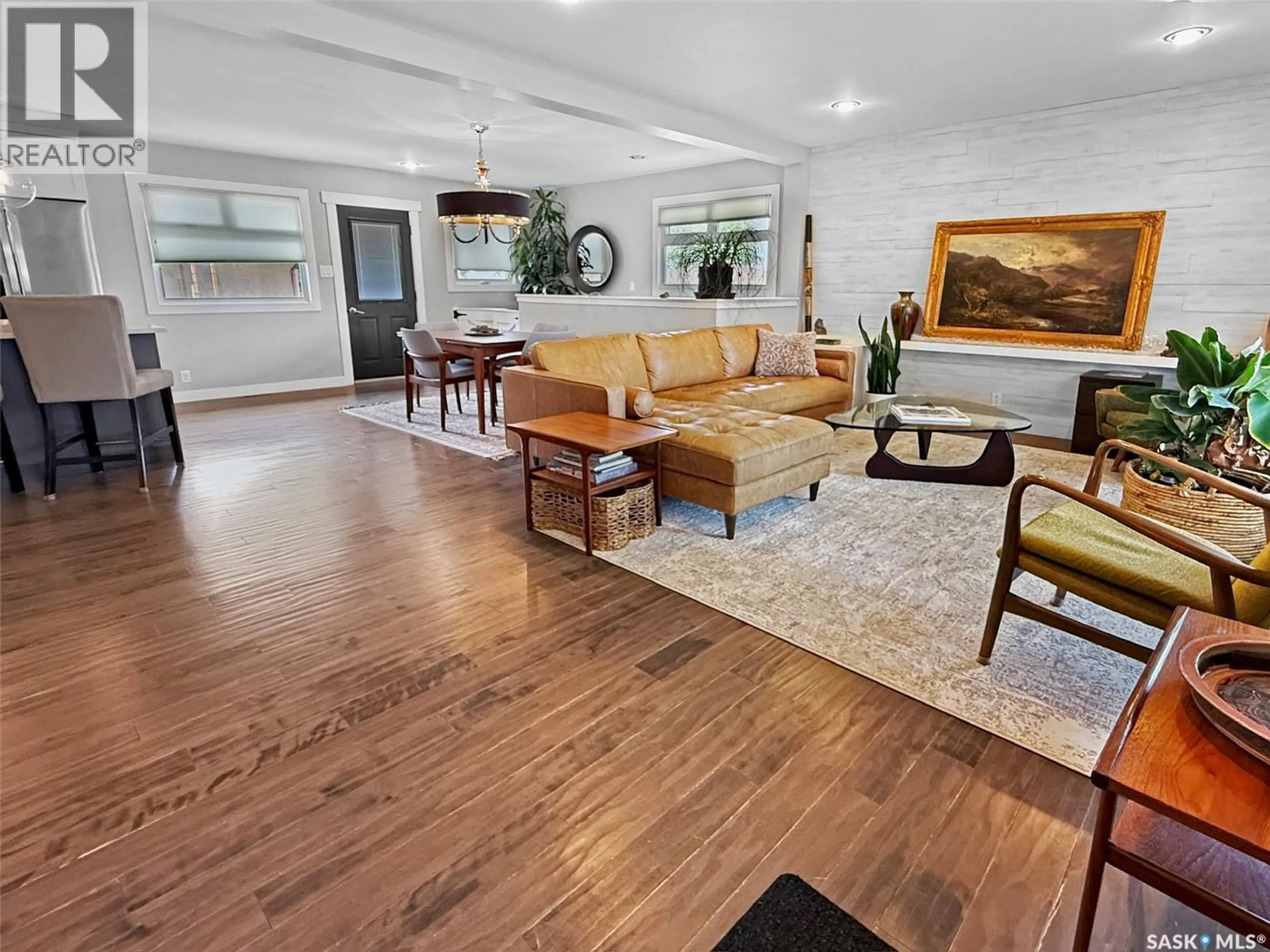 Living room with furniture, wood/laminate floor for 10 ALLEN DRIVE, Swift Current Saskatchewan S9H3A4