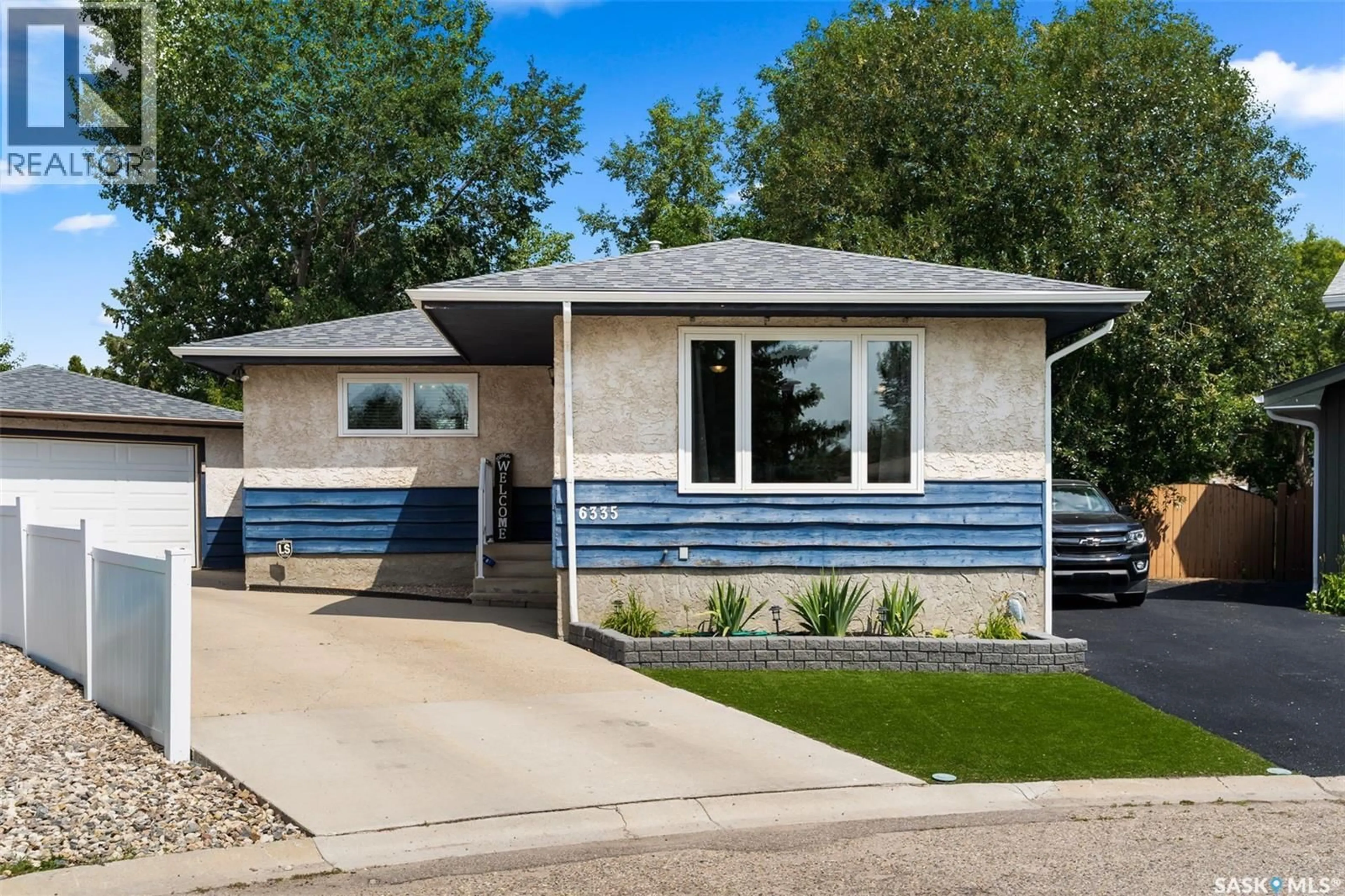 Home with vinyl exterior material, street for 6335 COHEN BAY, Regina Saskatchewan S4X2H5