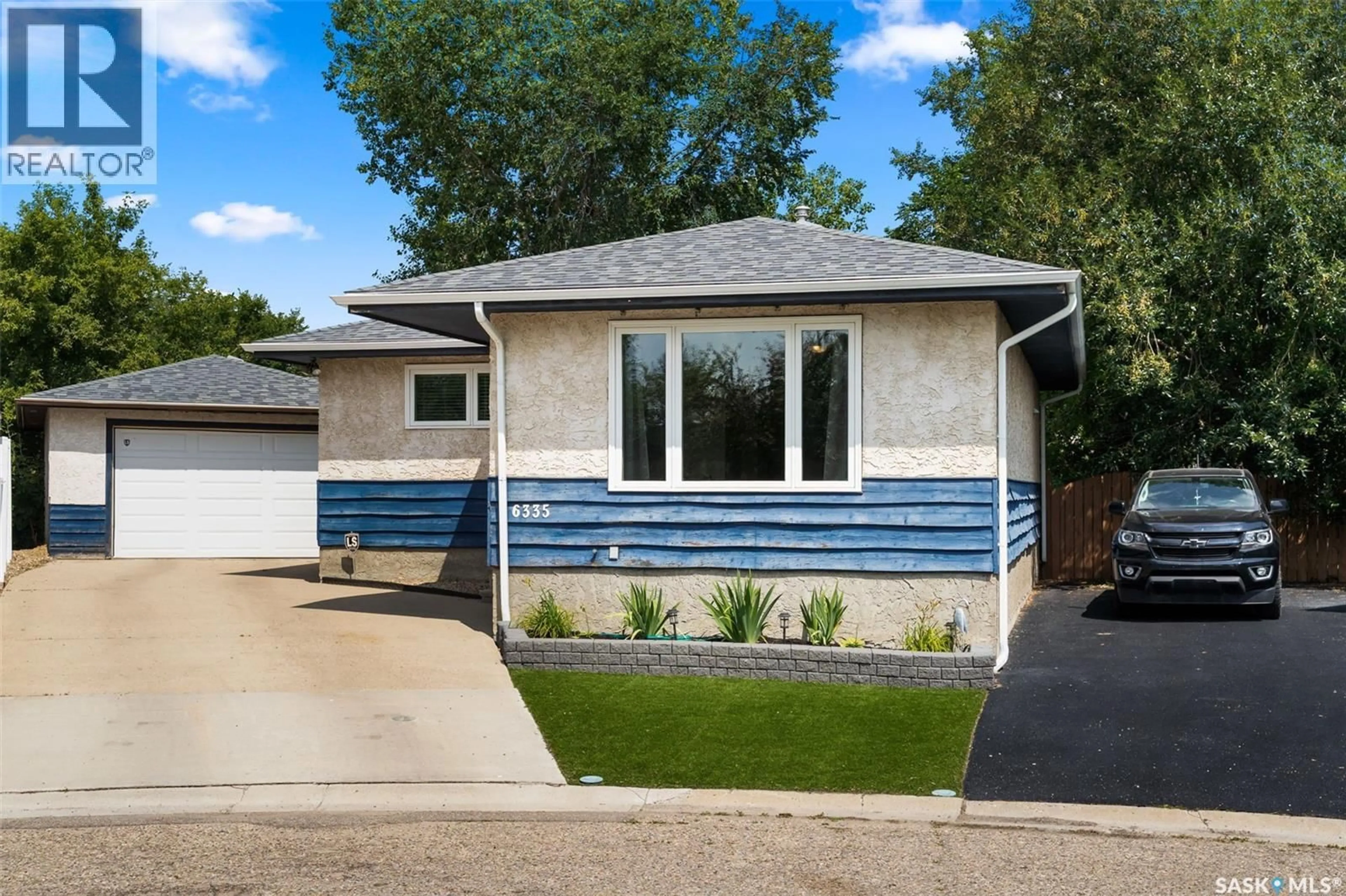 Home with vinyl exterior material, street for 6335 COHEN BAY, Regina Saskatchewan S4X2H5