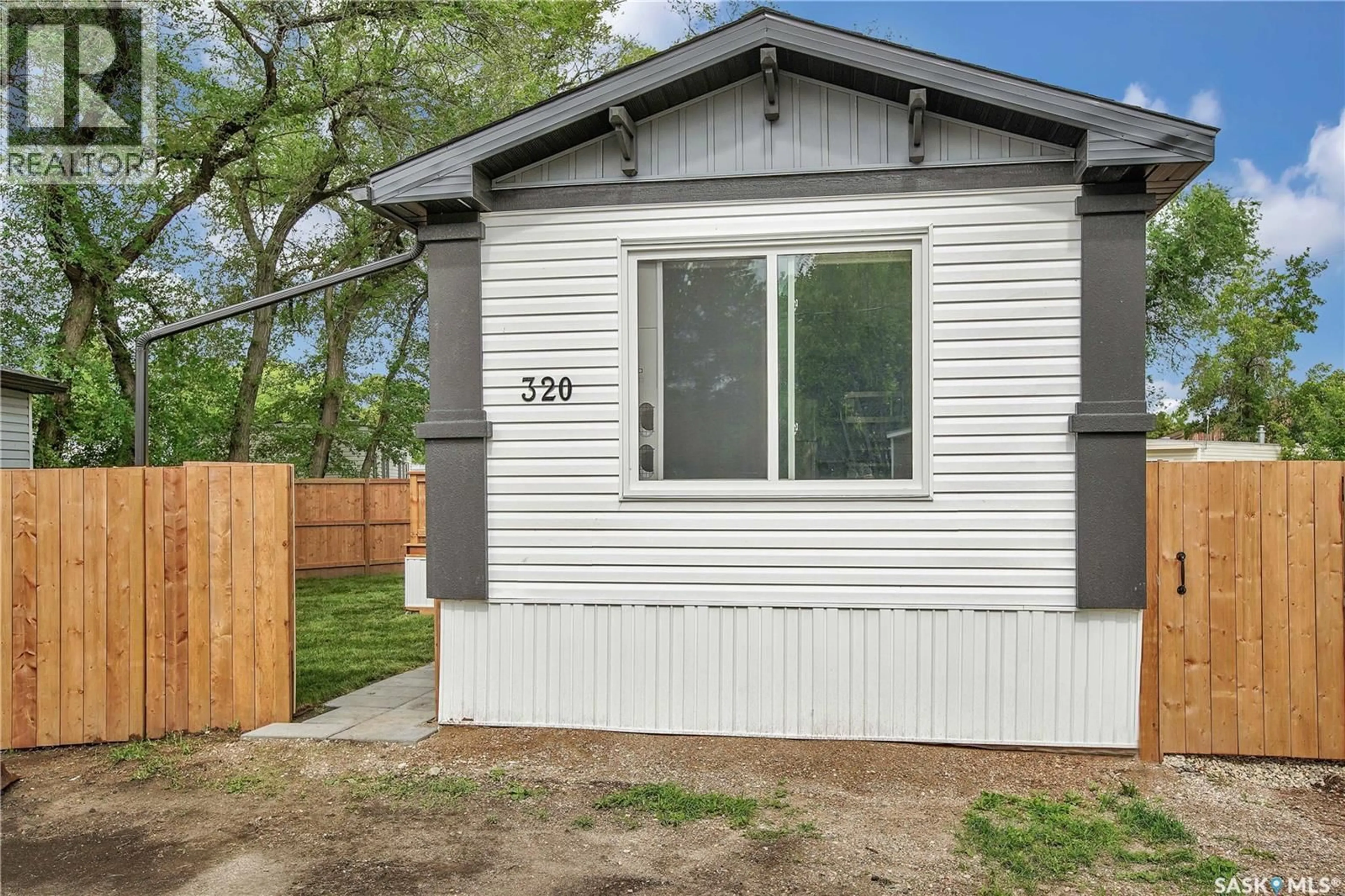 Home with vinyl exterior material, street for 1524 - 320 RAYNER AVENUE, Saskatoon Saskatchewan S7N2P8