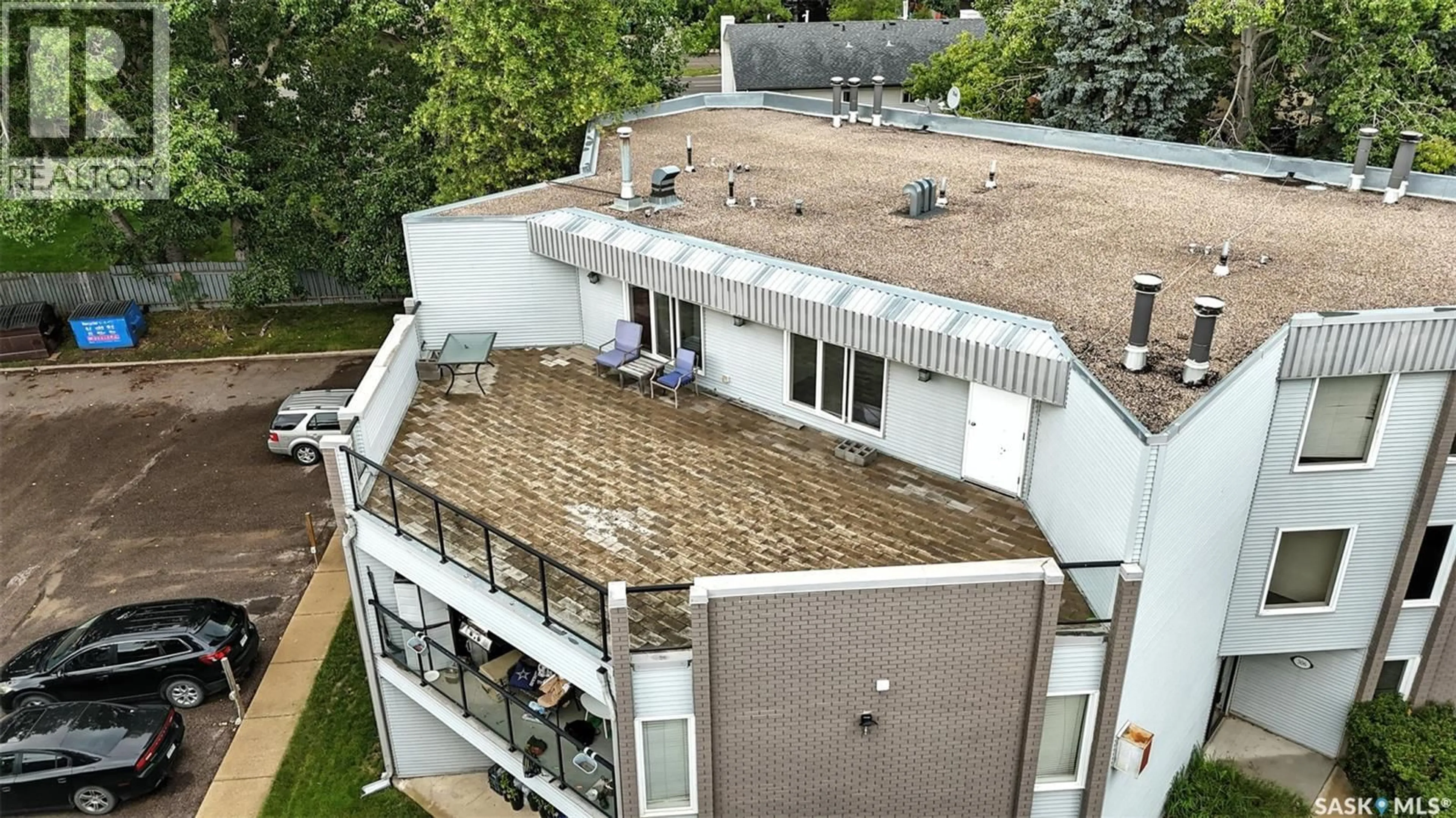 A pic from outside/outdoor area/front of a property/back of a property/a pic from drone, city buildings view from balcony for 306 - 303 TAIT CRESCENT, Saskatoon Saskatchewan S7H5L2