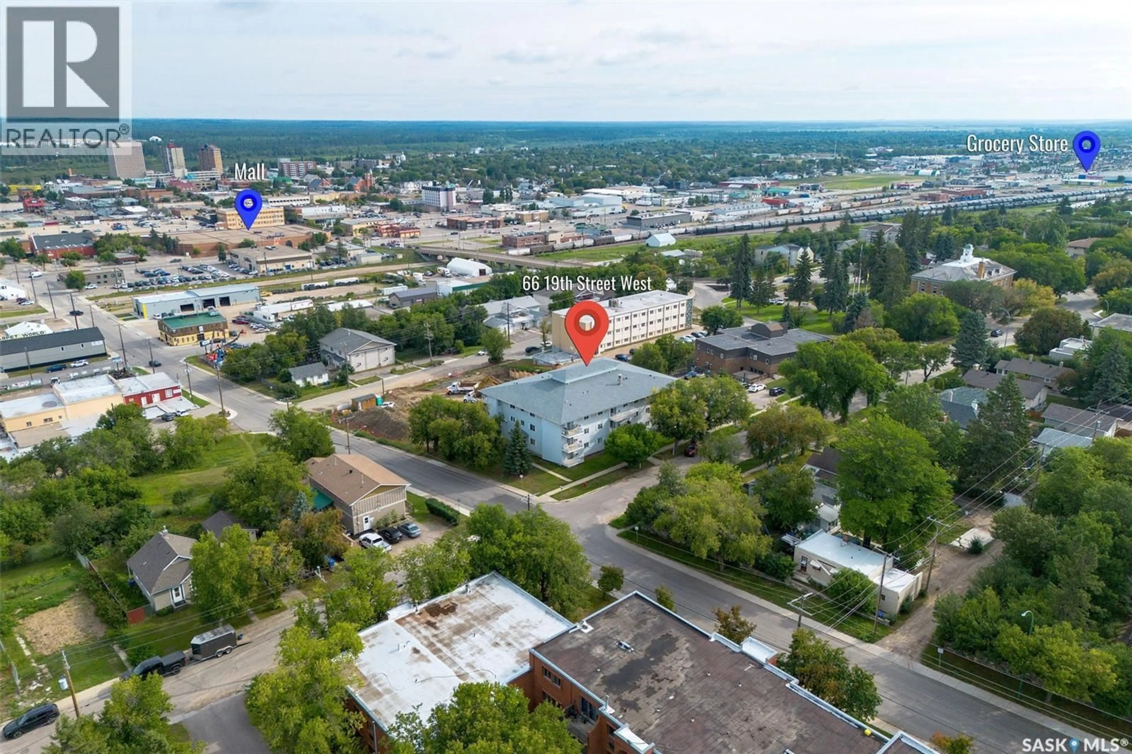 A pic from outside/outdoor area/front of a property/back of a property/a pic from drone, unknown for 99 - 306 19TH STREET, Prince Albert Saskatchewan S6V7T6
