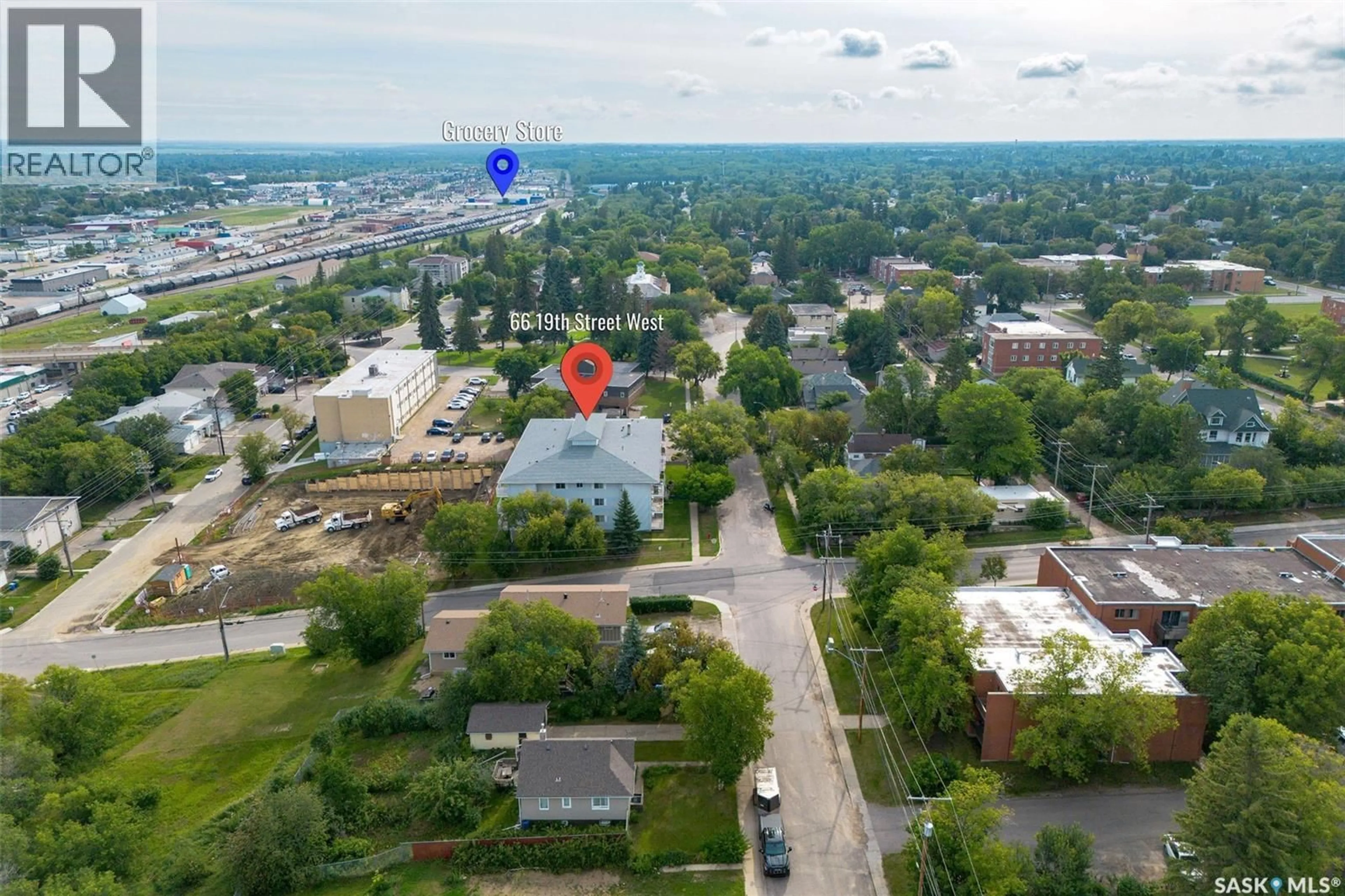 A pic from outside/outdoor area/front of a property/back of a property/a pic from drone, unknown for 99 - 306 19TH STREET, Prince Albert Saskatchewan S6V7T6