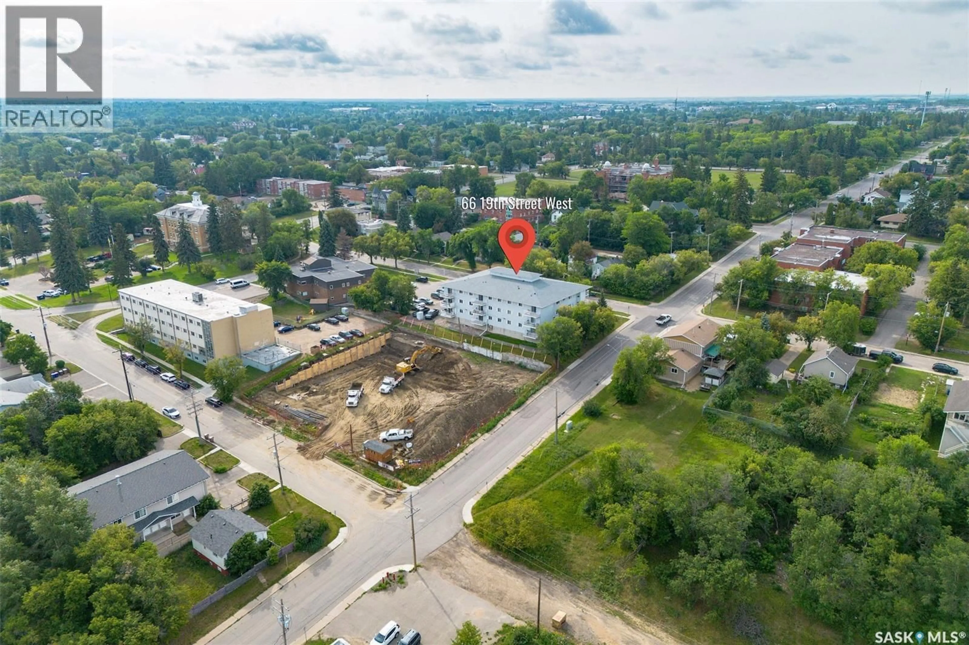 A pic from outside/outdoor area/front of a property/back of a property/a pic from drone, building for 99 - 306 19TH STREET, Prince Albert Saskatchewan S6V7T6