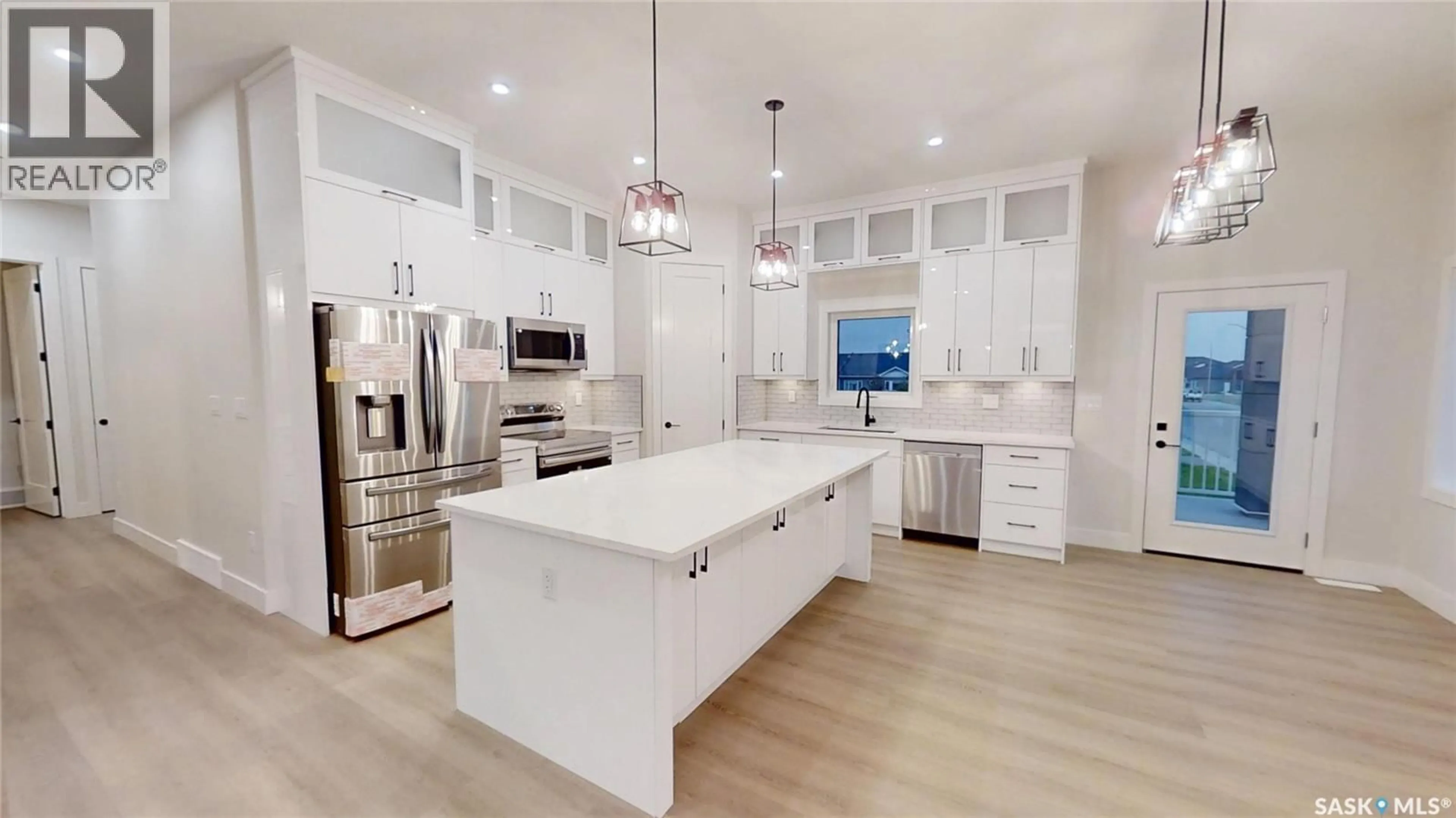 Open concept kitchen, unknown for 810 BALLESTEROS CRESCENT, Warman Saskatchewan S0K4S4