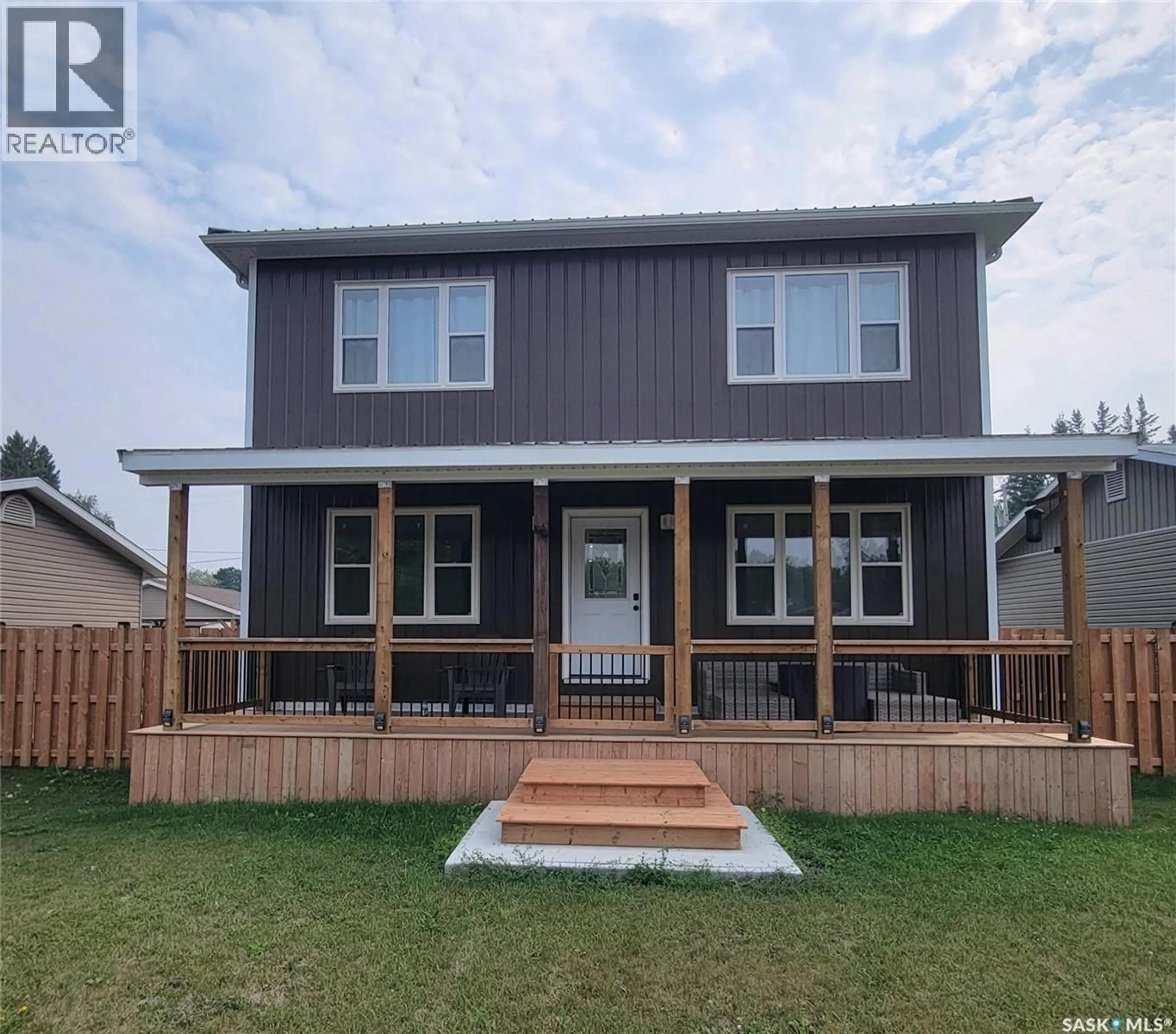 Home with vinyl exterior material, street for E - 513 HIGHWAY AVENUE, Preeceville Saskatchewan S0A3B0