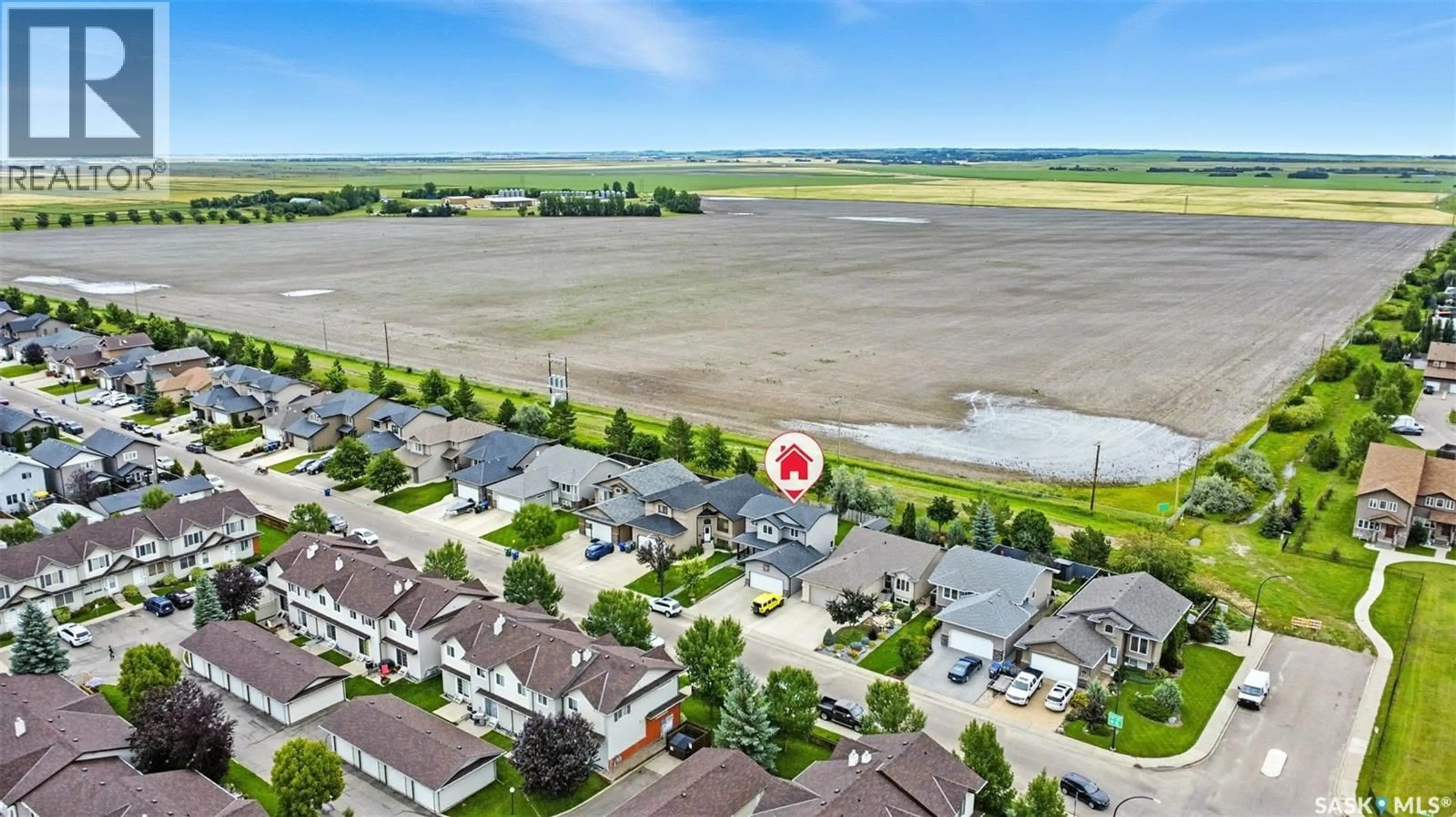 A pic from outside/outdoor area/front of a property/back of a property/a pic from drone, water/lake/river/ocean view for 114 LAMARSH ROAD, Saskatoon Saskatchewan S7W1B7