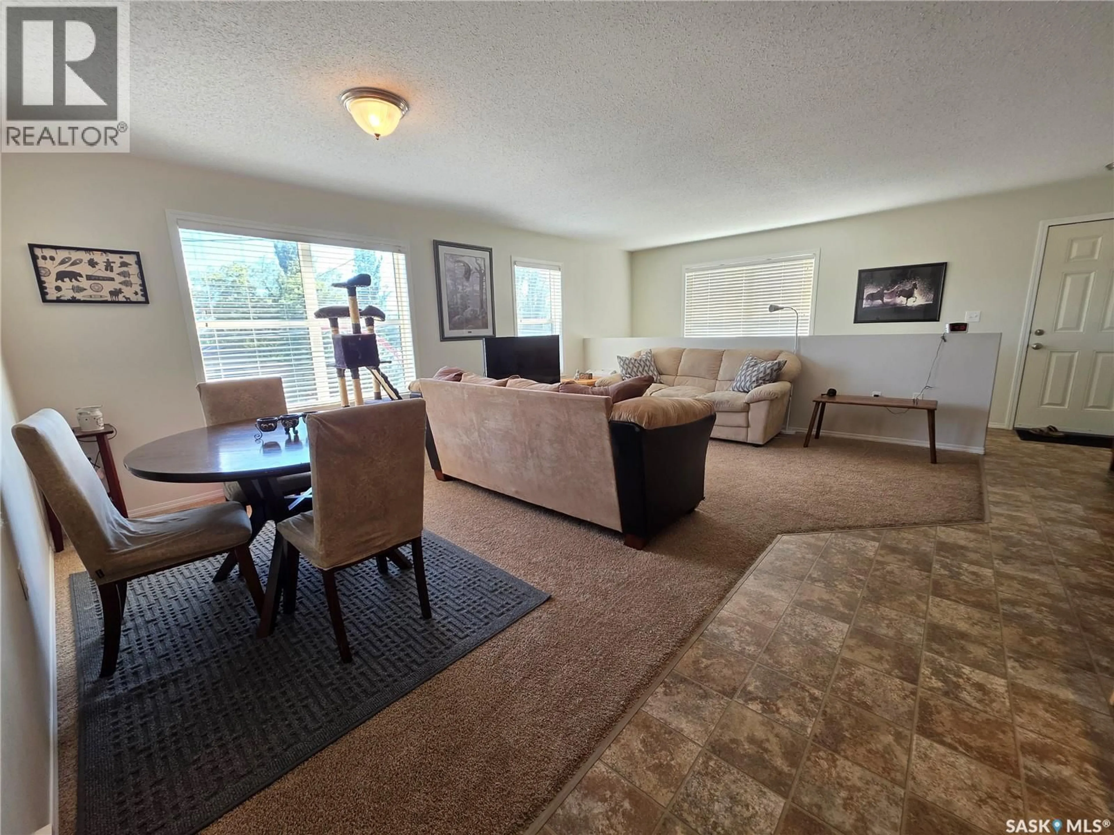 Living room with furniture, unknown for E - 22 1275 SOUTH RAILWAY STREET, Swift Current Saskatchewan S9H5P3