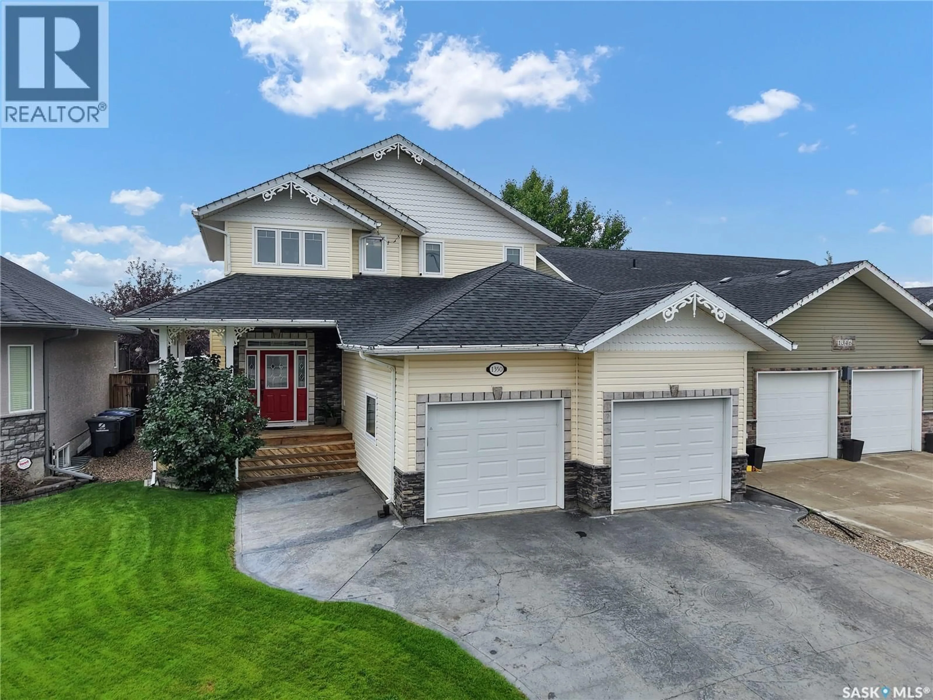 Home with vinyl exterior material, street for 1350 WILLOWGROVE TERRACE, Saskatoon Saskatchewan S7W0A9