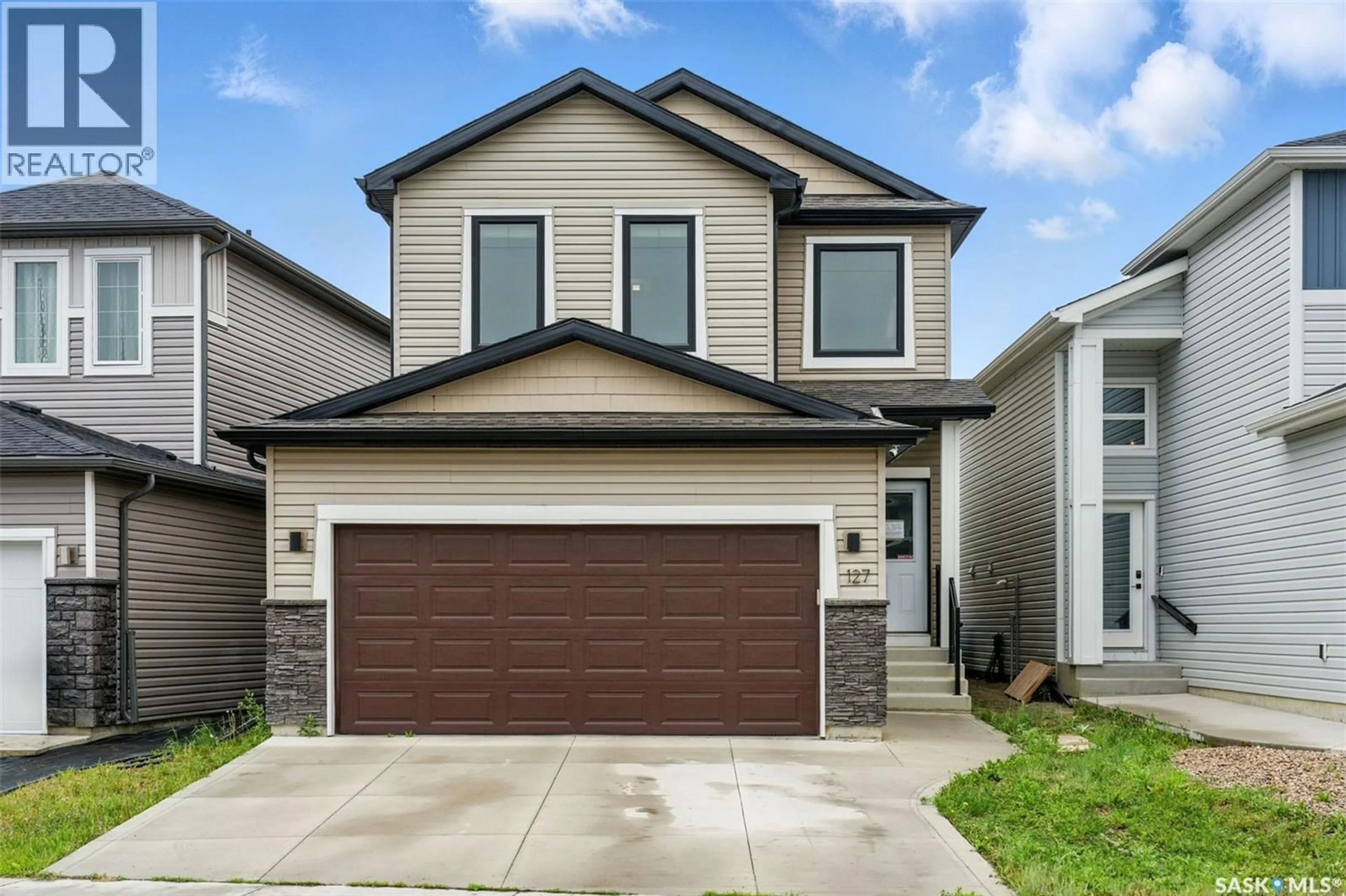 Home with vinyl exterior material, street for 127 BURGESS CRESCENT, Saskatoon Saskatchewan S7V0S1