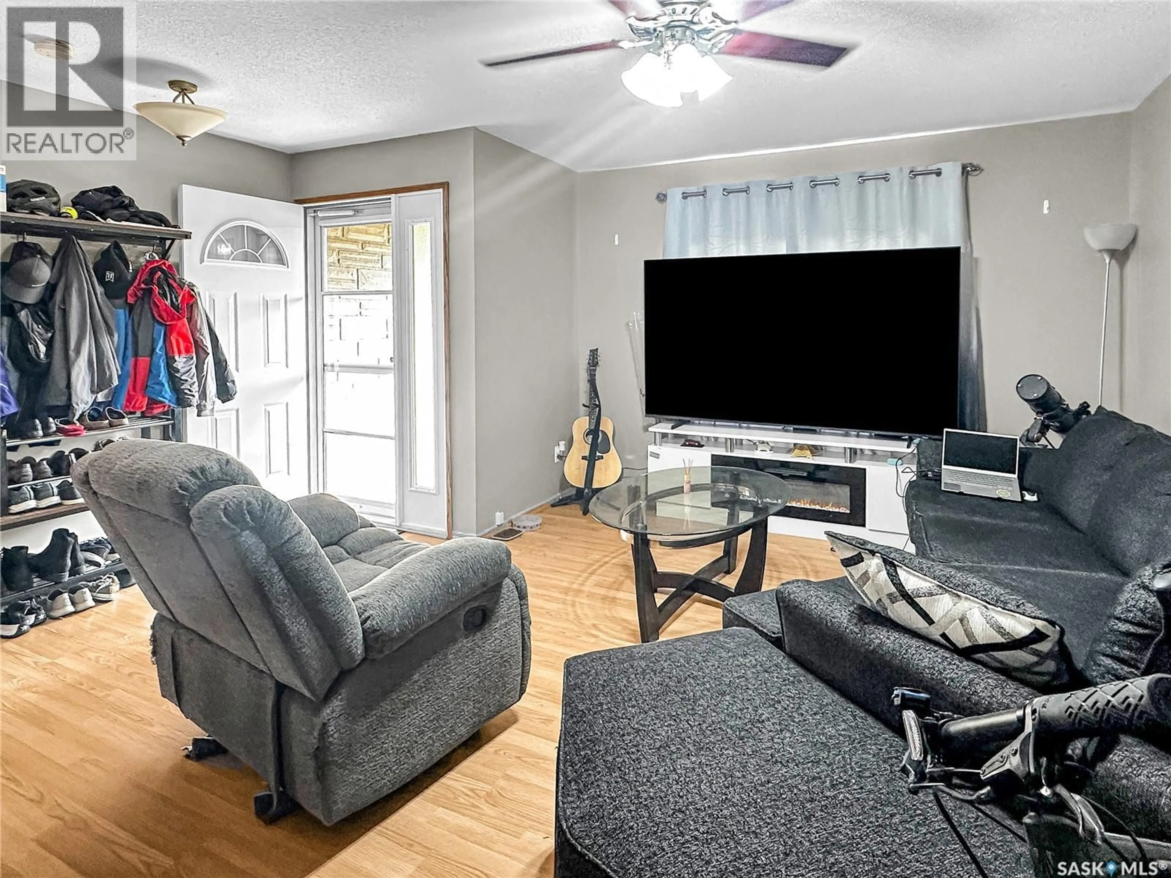 Living room with furniture, unknown for 521 103RD STREET, North Battleford Saskatchewan S9A1J6