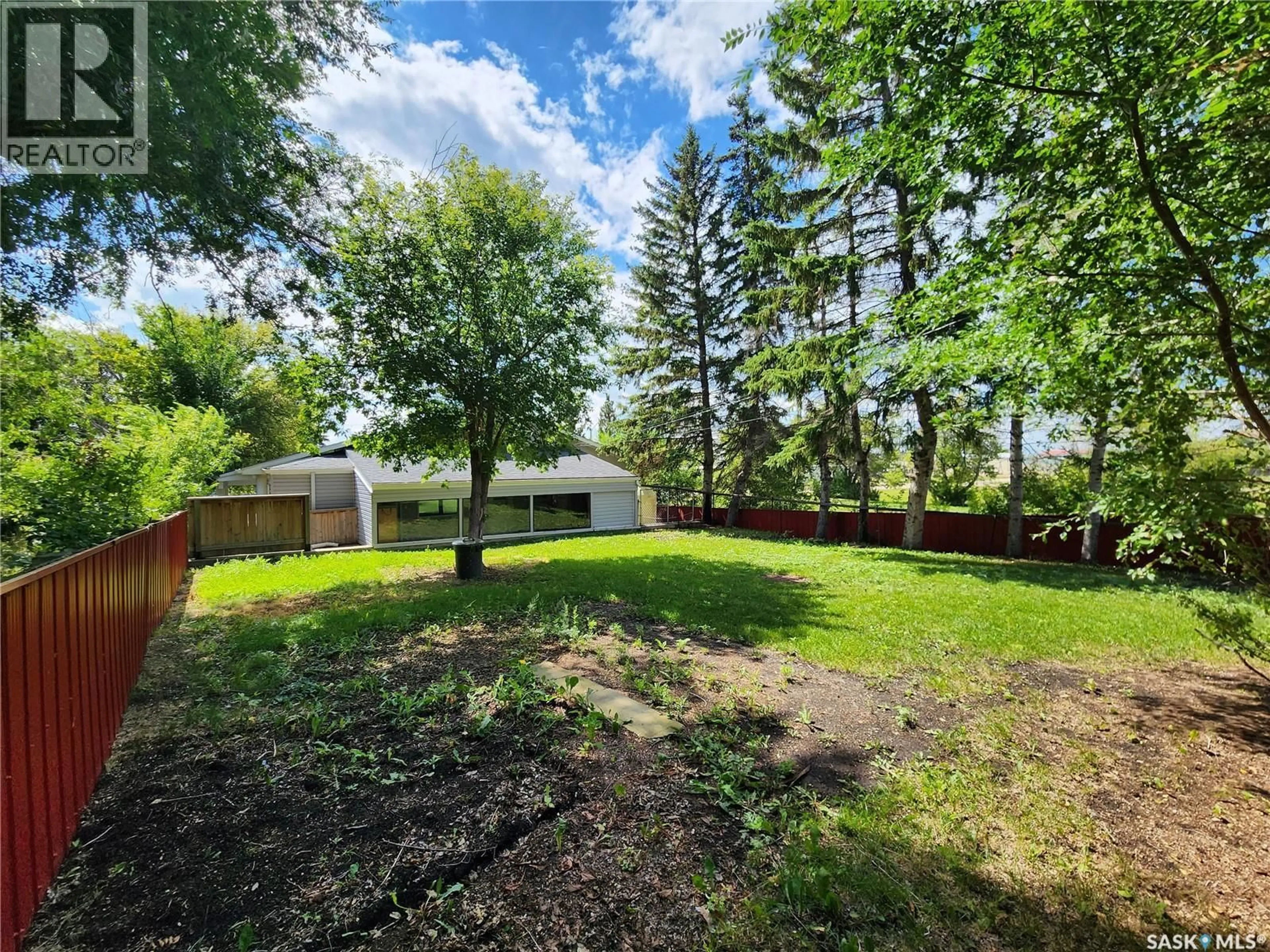 A pic from outside/outdoor area/front of a property/back of a property/a pic from drone, forest/trees view for 356 2ND AVENUE, Melville Saskatchewan S0A2P0