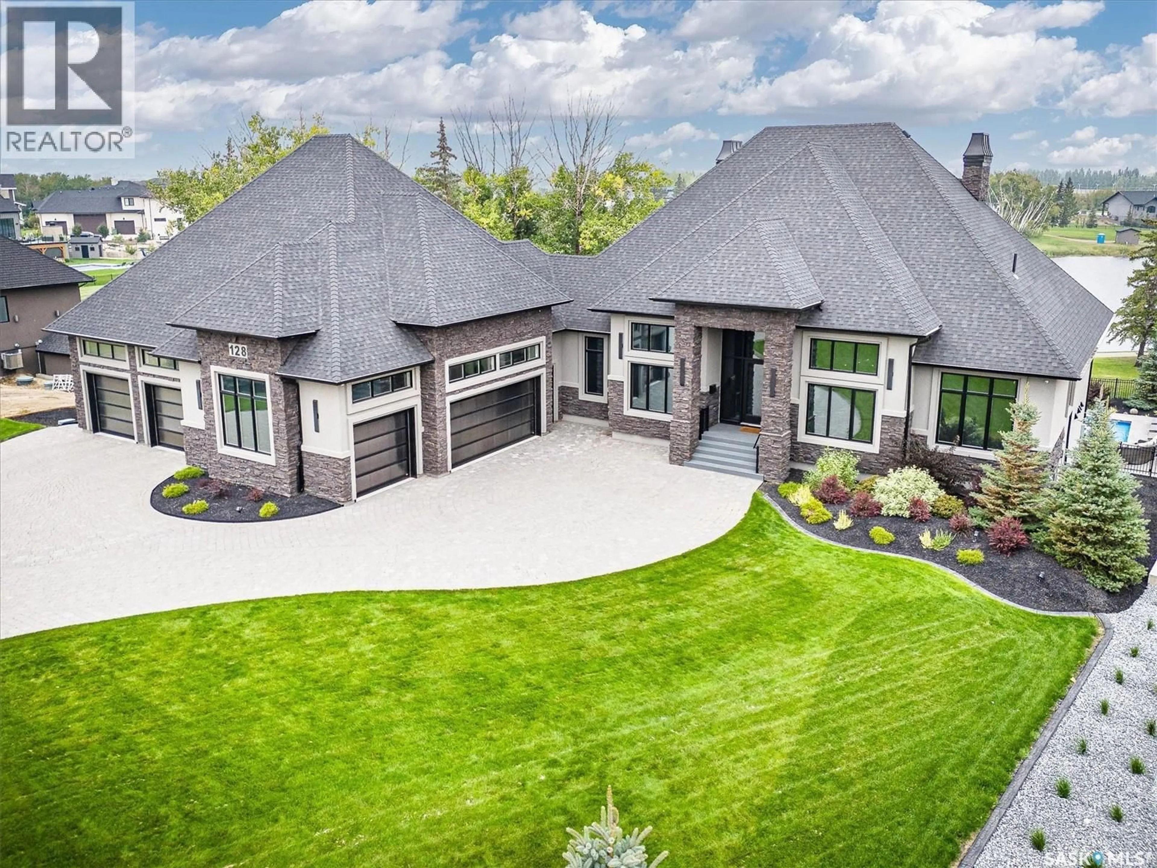 A pic from outside/outdoor area/front of a property/back of a property/a pic from drone, street for 128 GREENBRYRE CRESCENT, Corman Park Rm No. 344 Saskatchewan S7V0J5