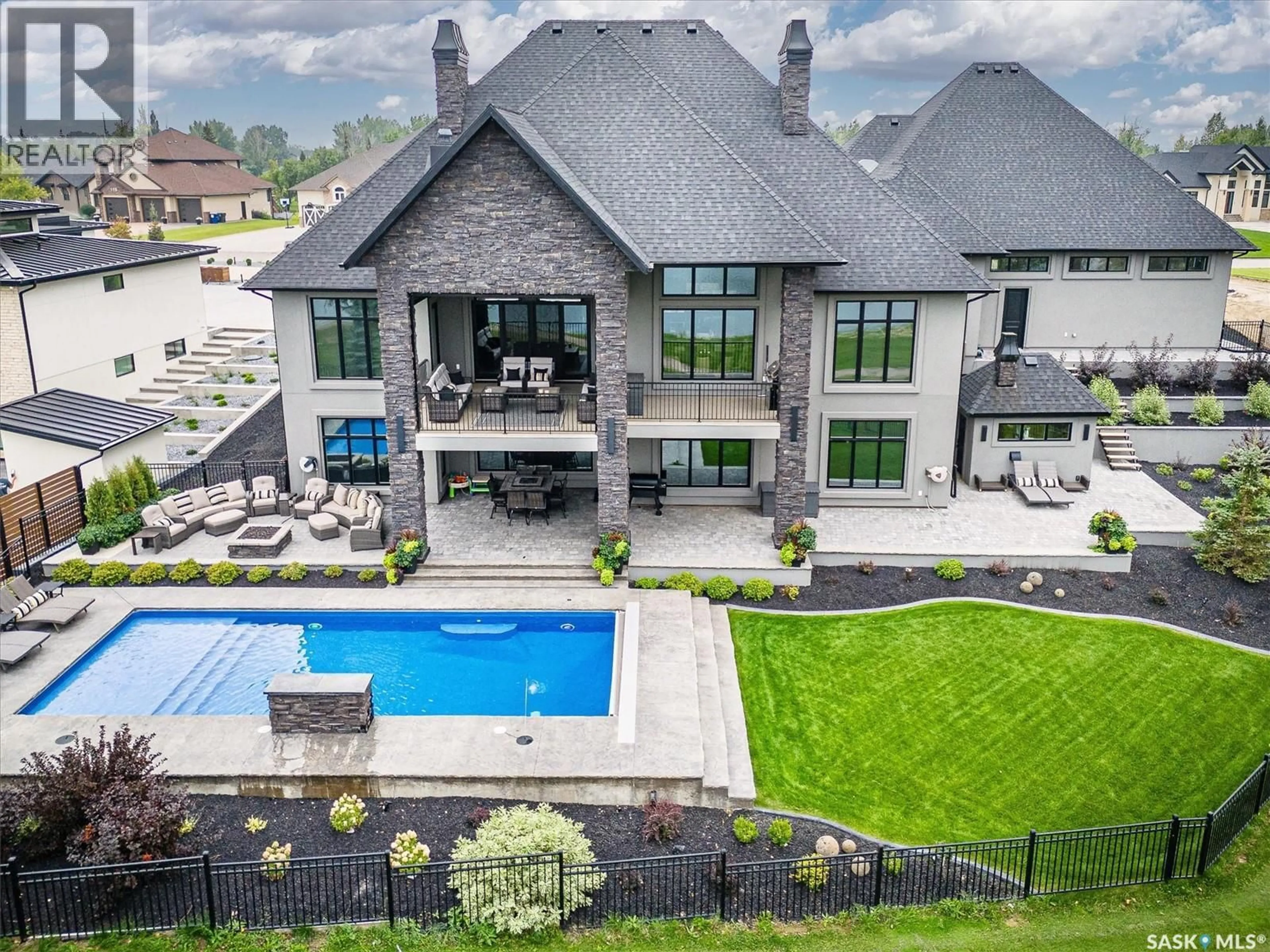 A pic from outside/outdoor area/front of a property/back of a property/a pic from drone, unknown for 128 GREENBRYRE CRESCENT, Corman Park Rm No. 344 Saskatchewan S7V0J5