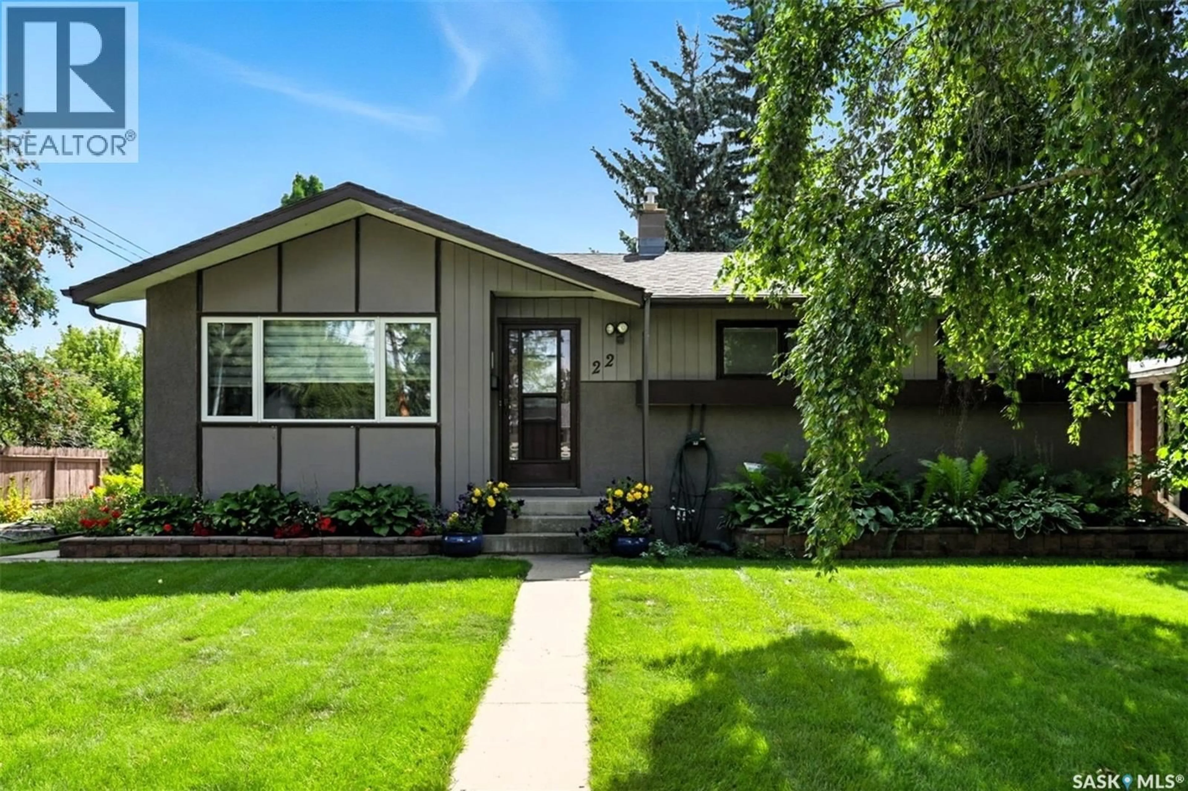 Home with vinyl exterior material, street for 22 CANTLON CRESCENT, Saskatoon Saskatchewan S7J2T3