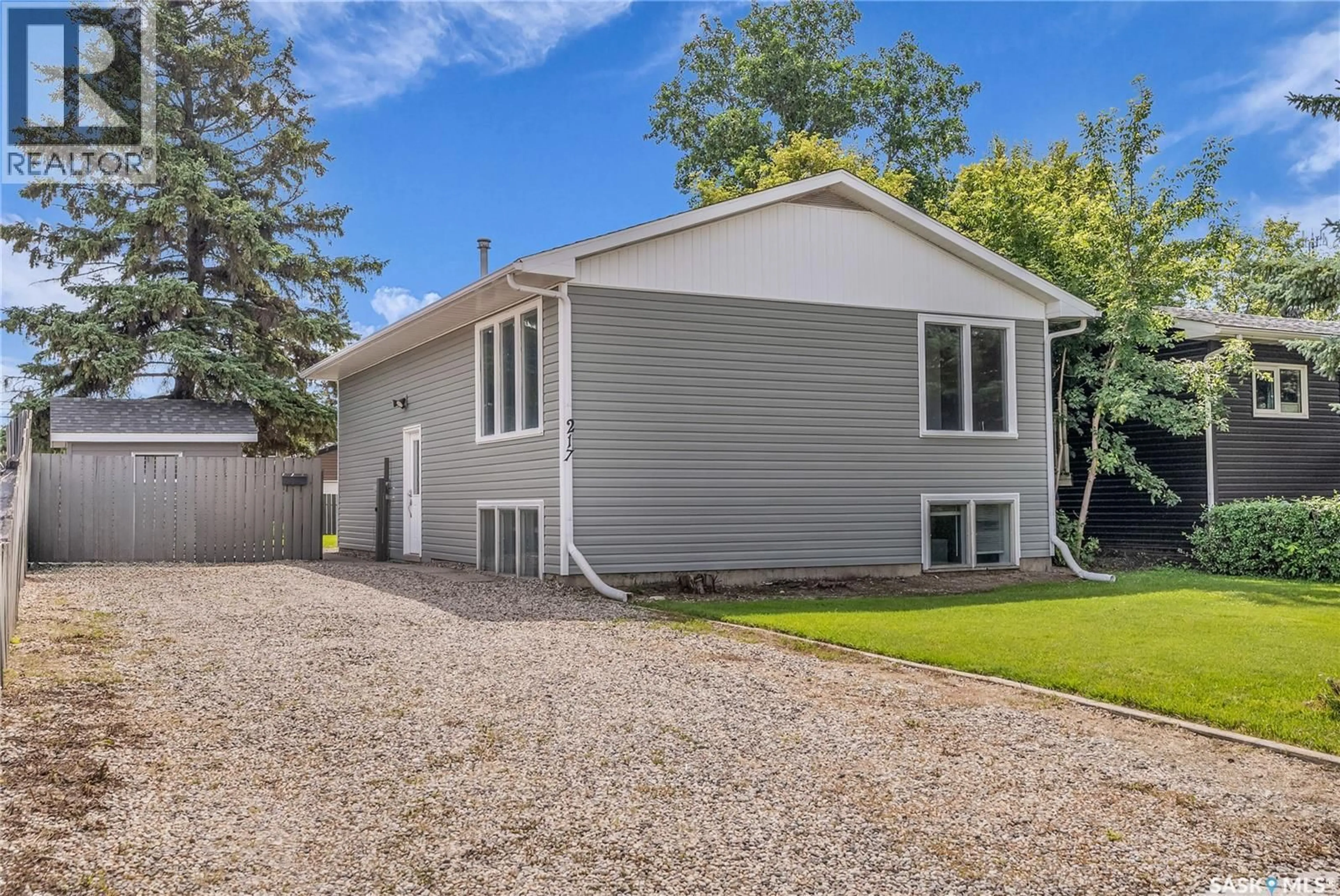 Home with vinyl exterior material, street for 217 BOYD STREET, Saskatoon Saskatchewan S7N2C8