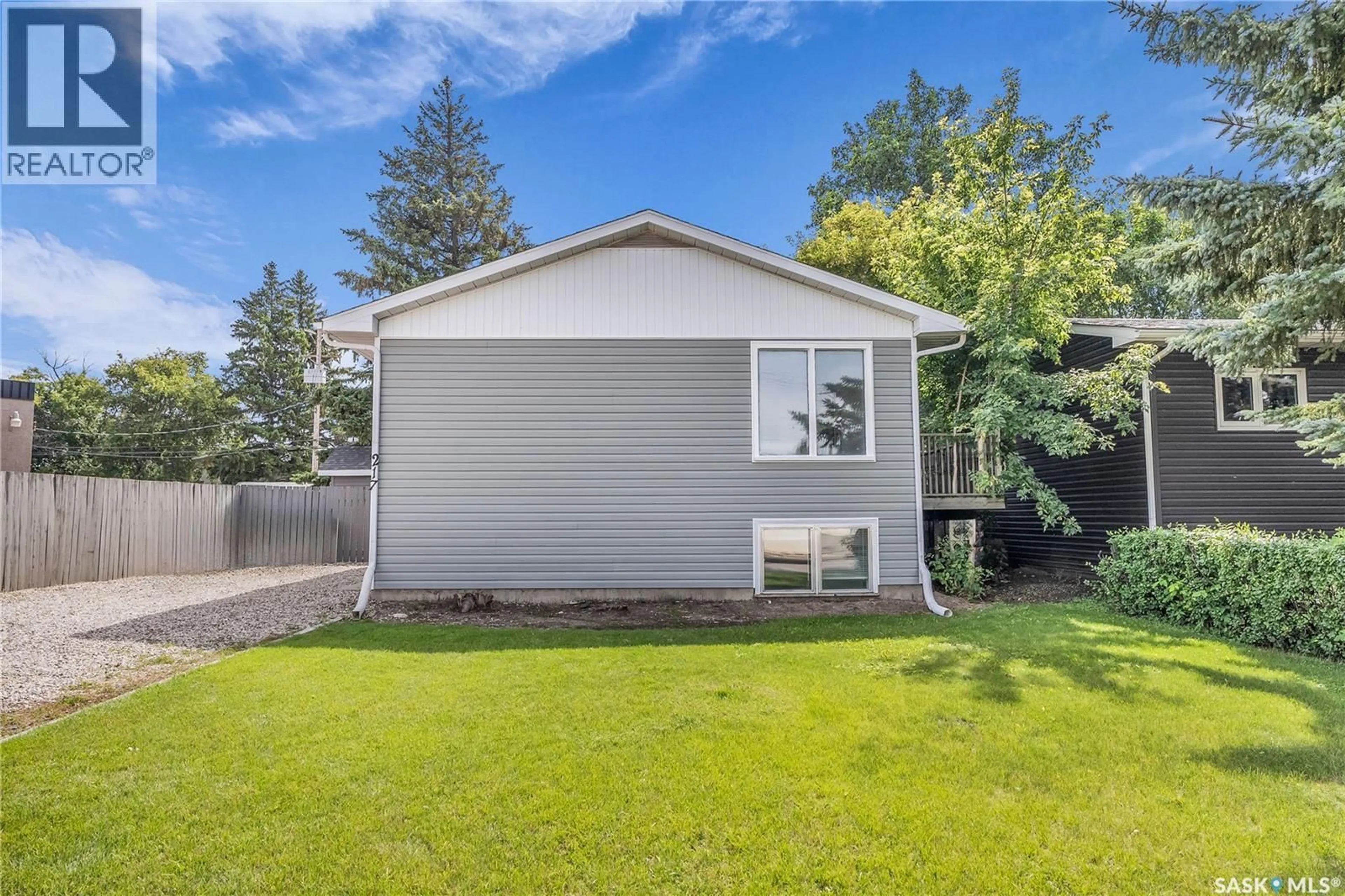 Home with vinyl exterior material, street for 217 BOYD STREET, Saskatoon Saskatchewan S7N2C8
