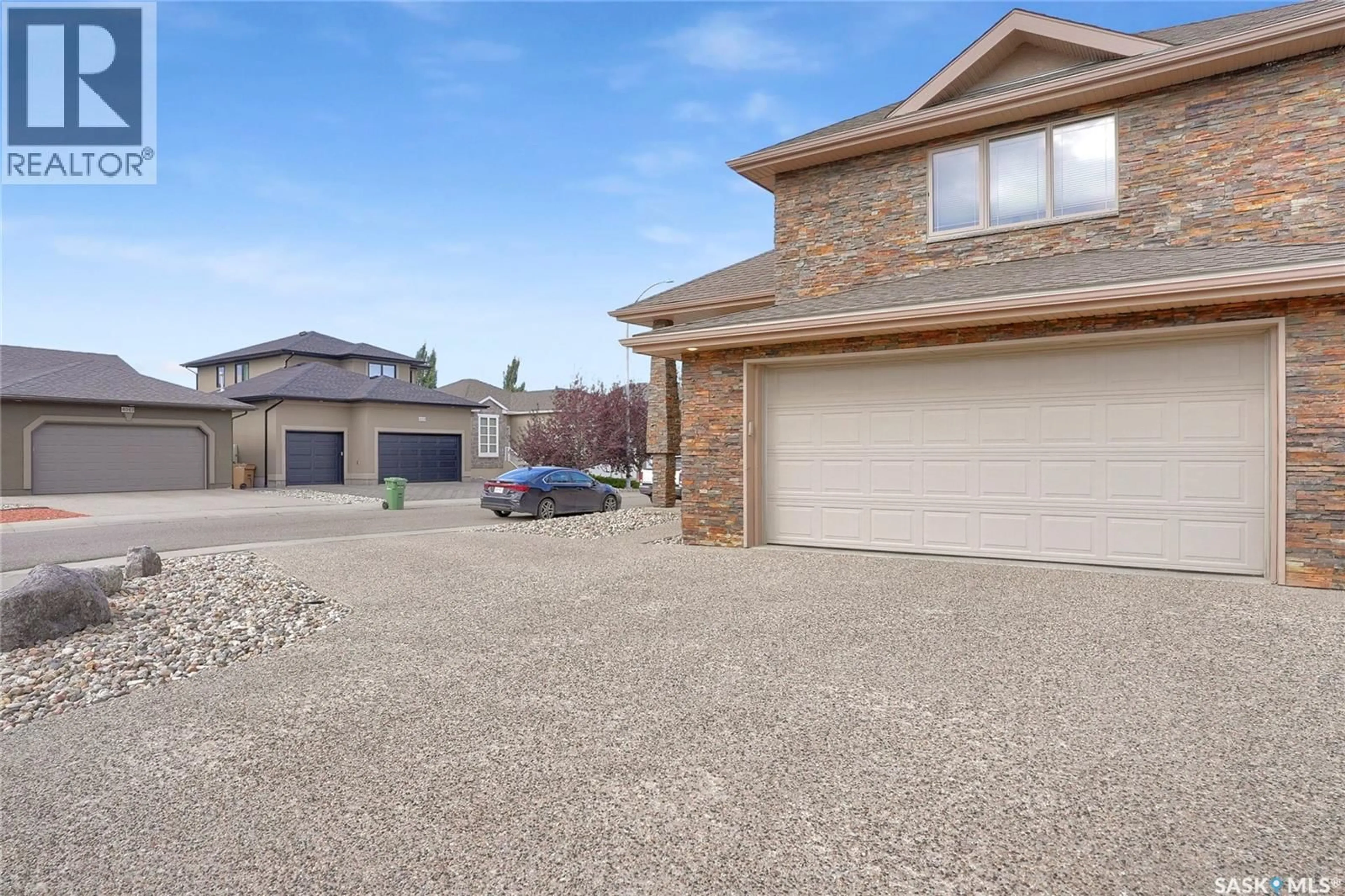 A pic from outside/outdoor area/front of a property/back of a property/a pic from drone, street for 2402 JAMESON CRESCENT, Regina Saskatchewan S4V1J7