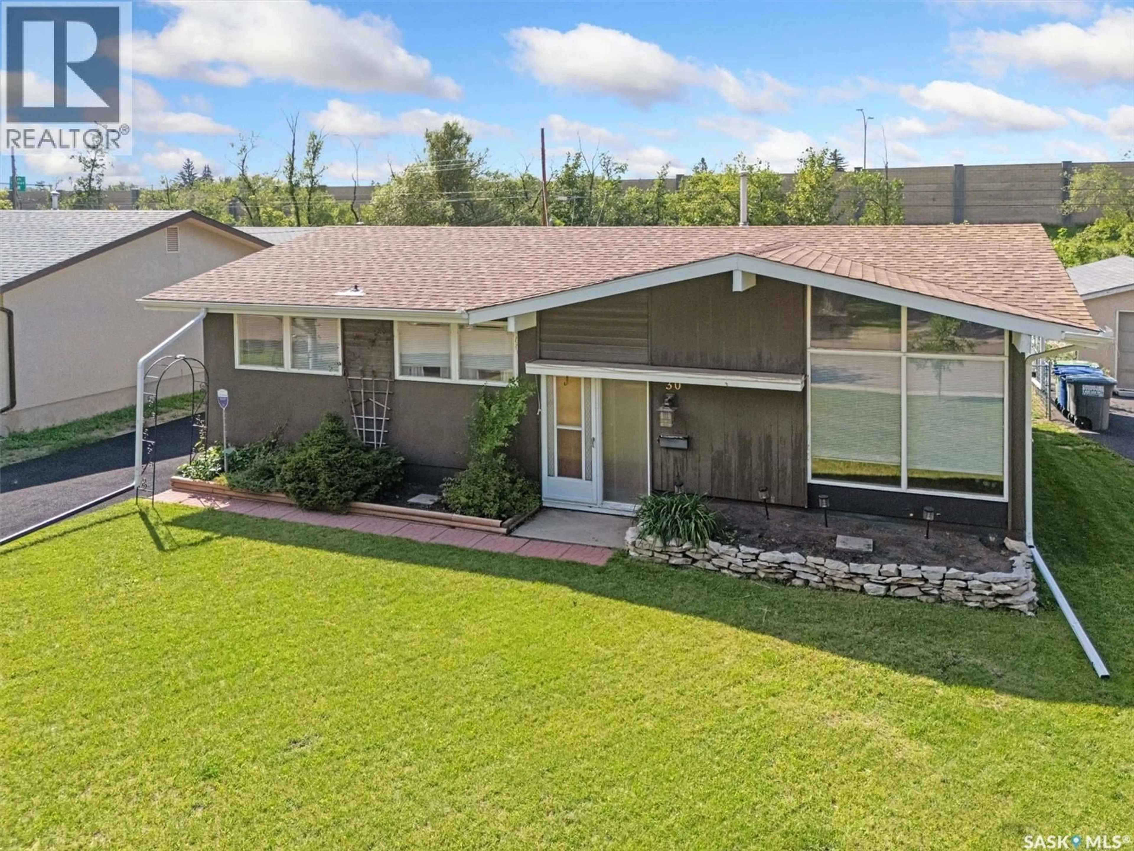 A pic from outside/outdoor area/front of a property/back of a property/a pic from drone, mountain view for 30 SPINKS DRIVE, Saskatoon Saskatchewan S7H3W8