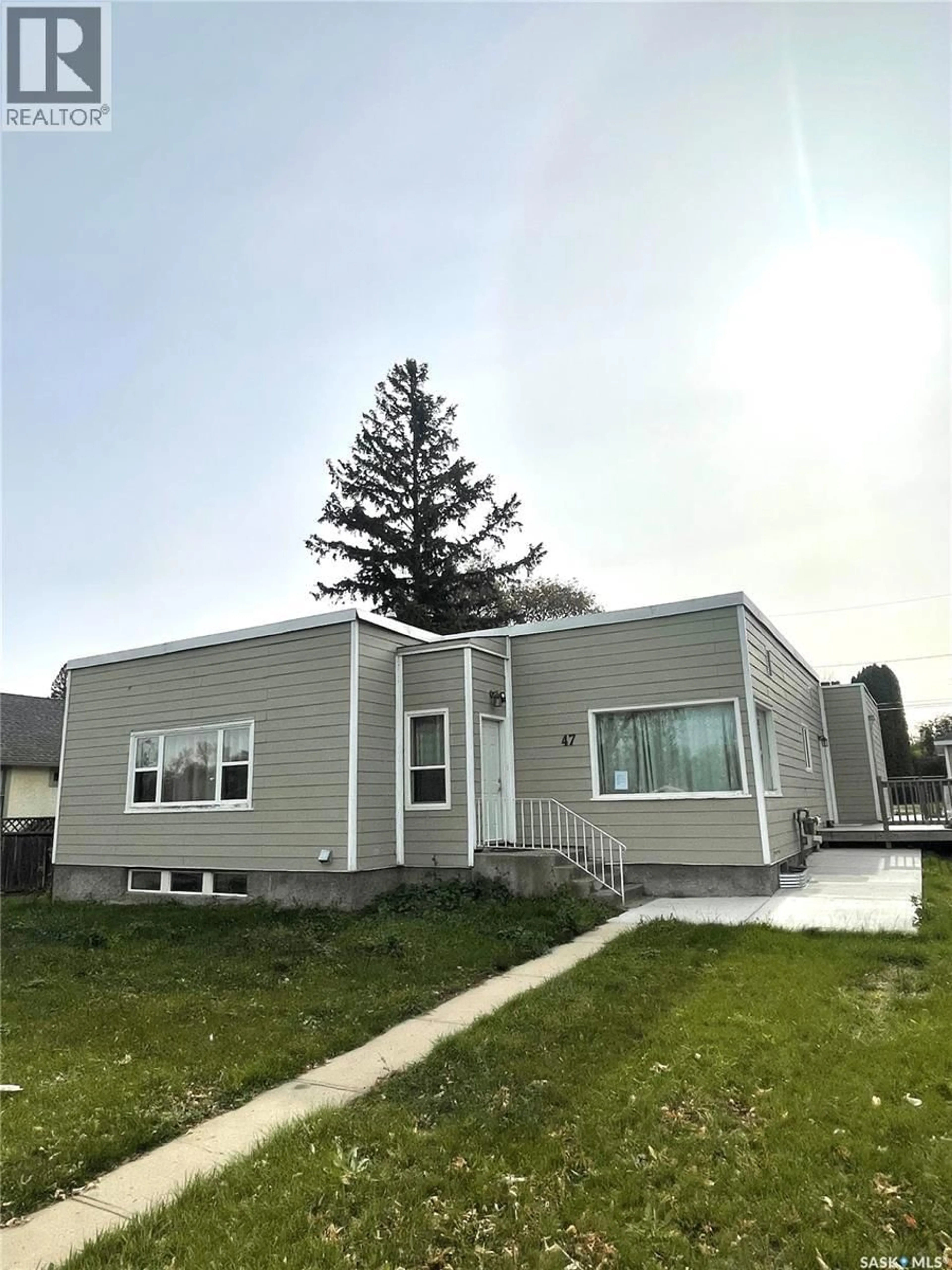 Home with vinyl exterior material, street for 47 21ST STREET, Prince Albert Saskatchewan S6V1L7