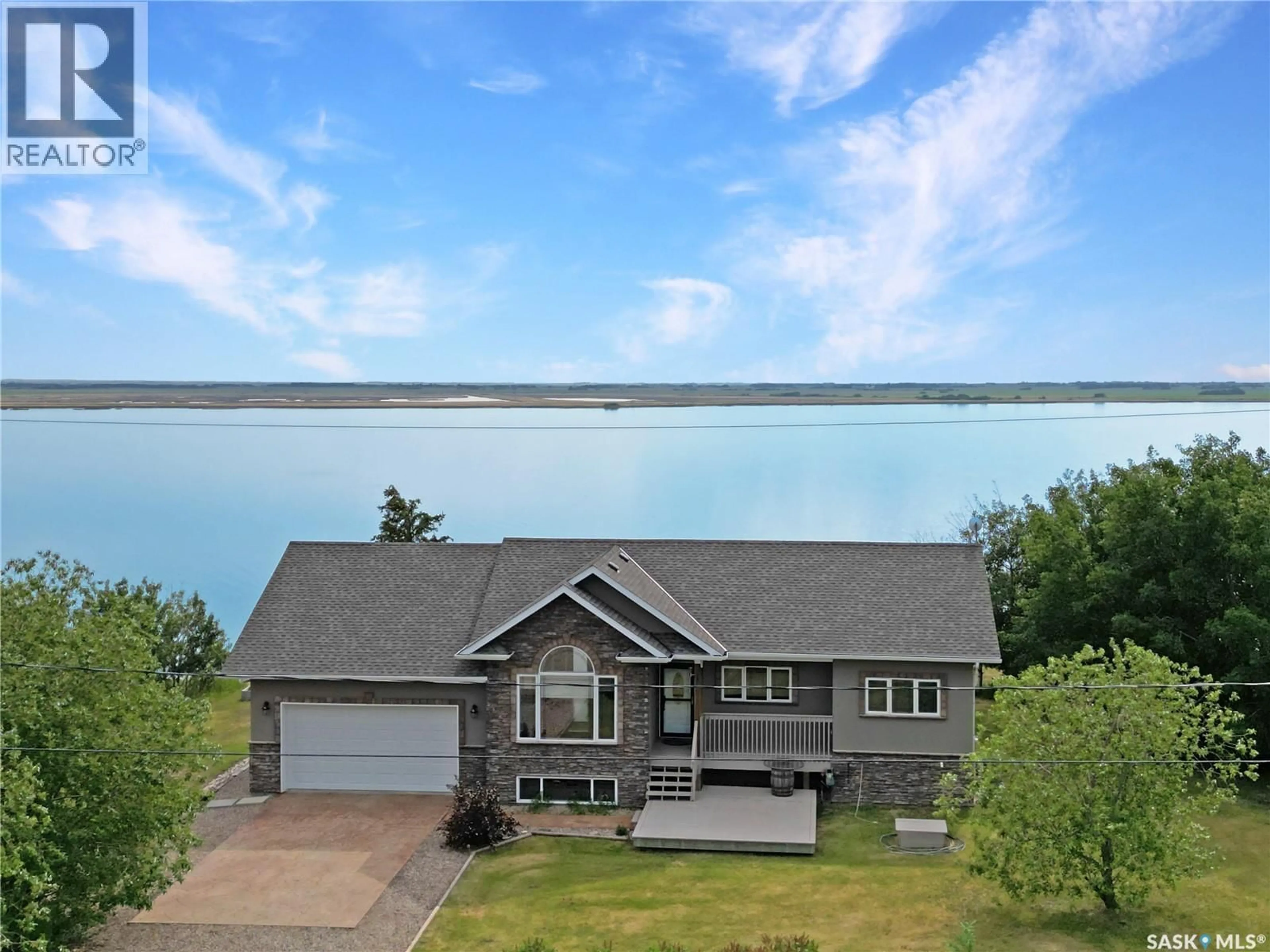 A pic from outside/outdoor area/front of a property/back of a property/a pic from drone, water/lake/river/ocean view for 1 SUMMERFIELD DRIVE, Meota Rm No.468 Saskatchewan S0M0L0