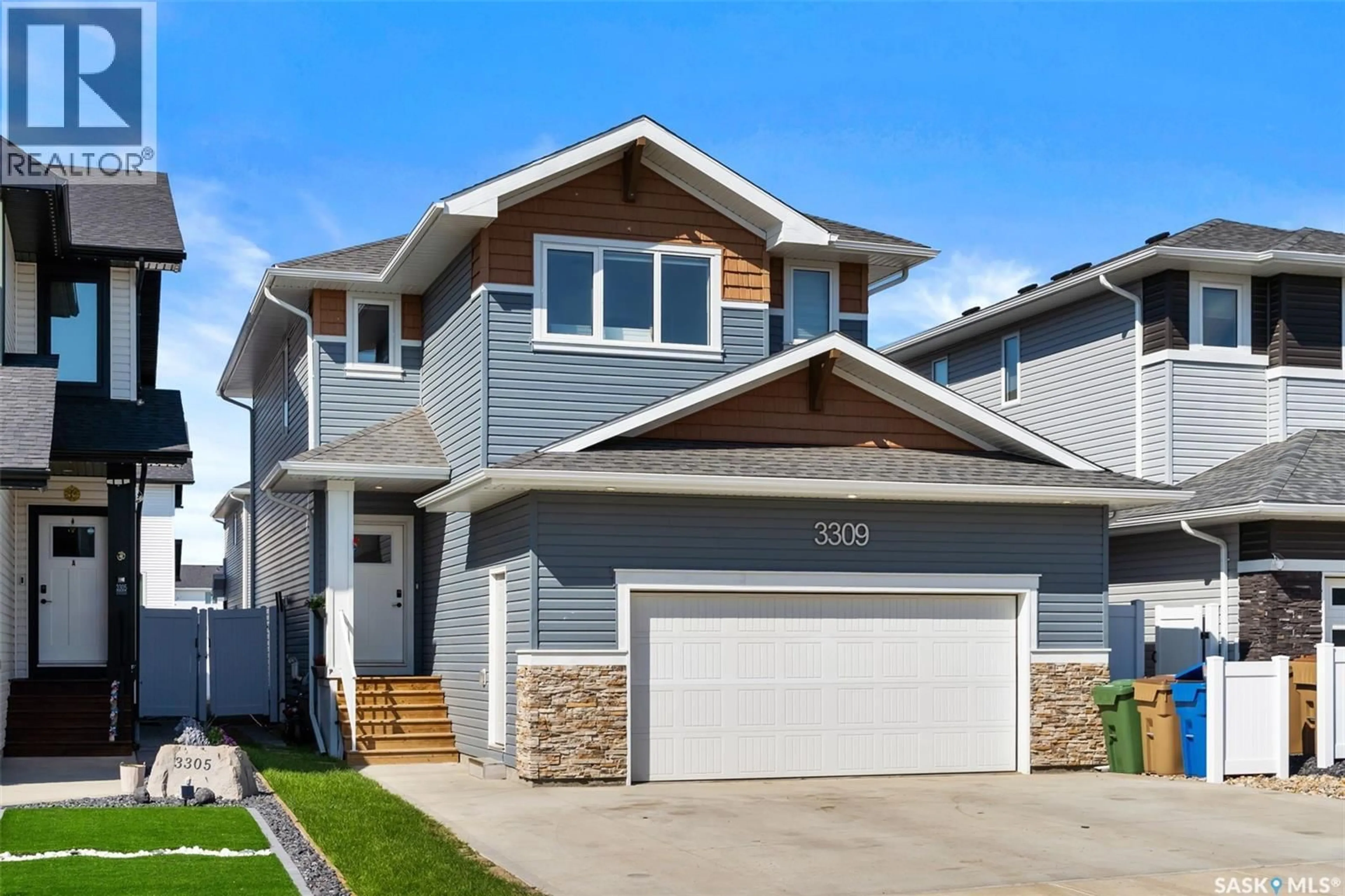 Home with vinyl exterior material, street for 3309 FAVEL DRIVE, Regina Saskatchewan S4V4B2