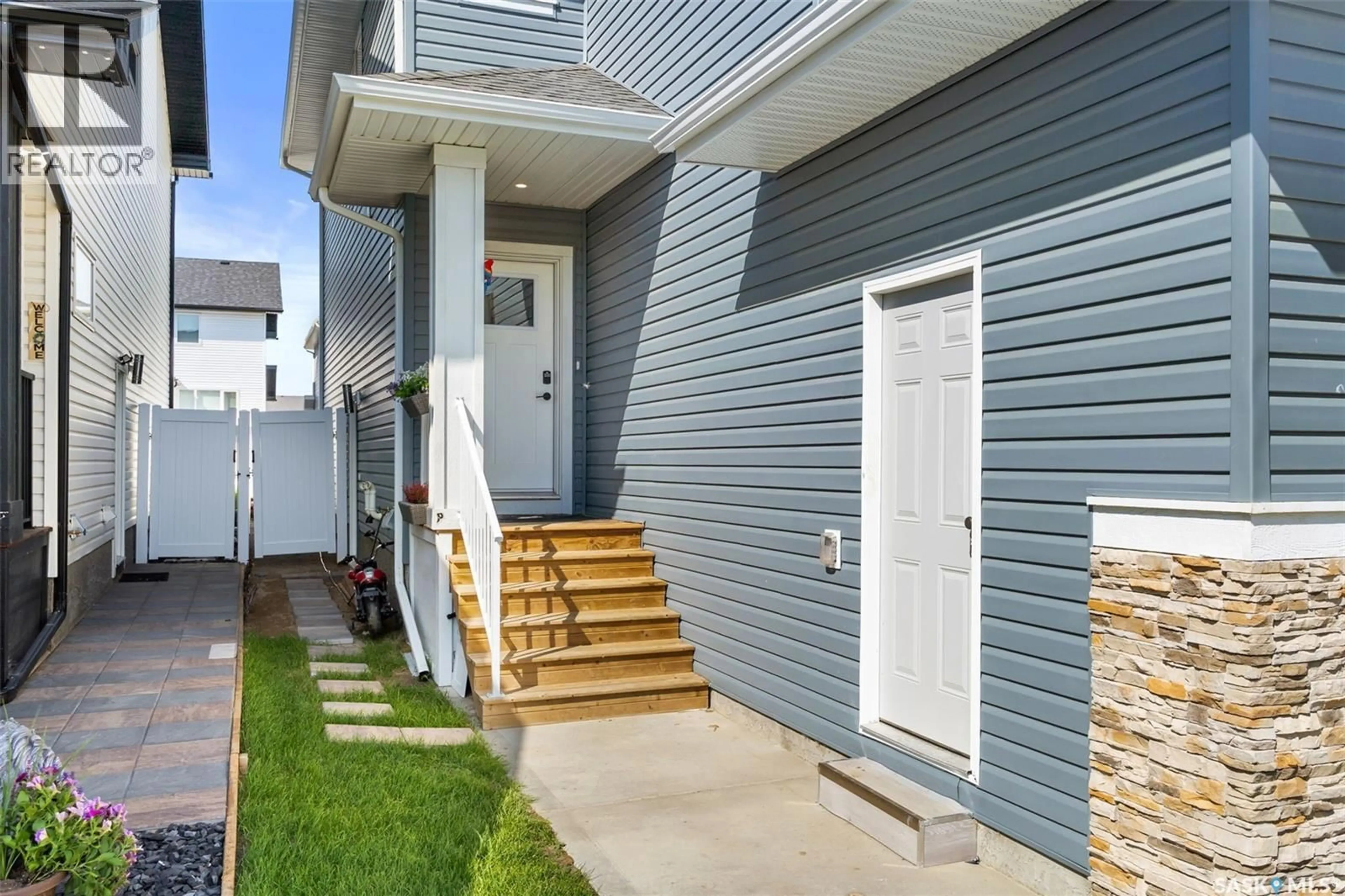 Home with vinyl exterior material, street for 3309 FAVEL DRIVE, Regina Saskatchewan S4V4B2