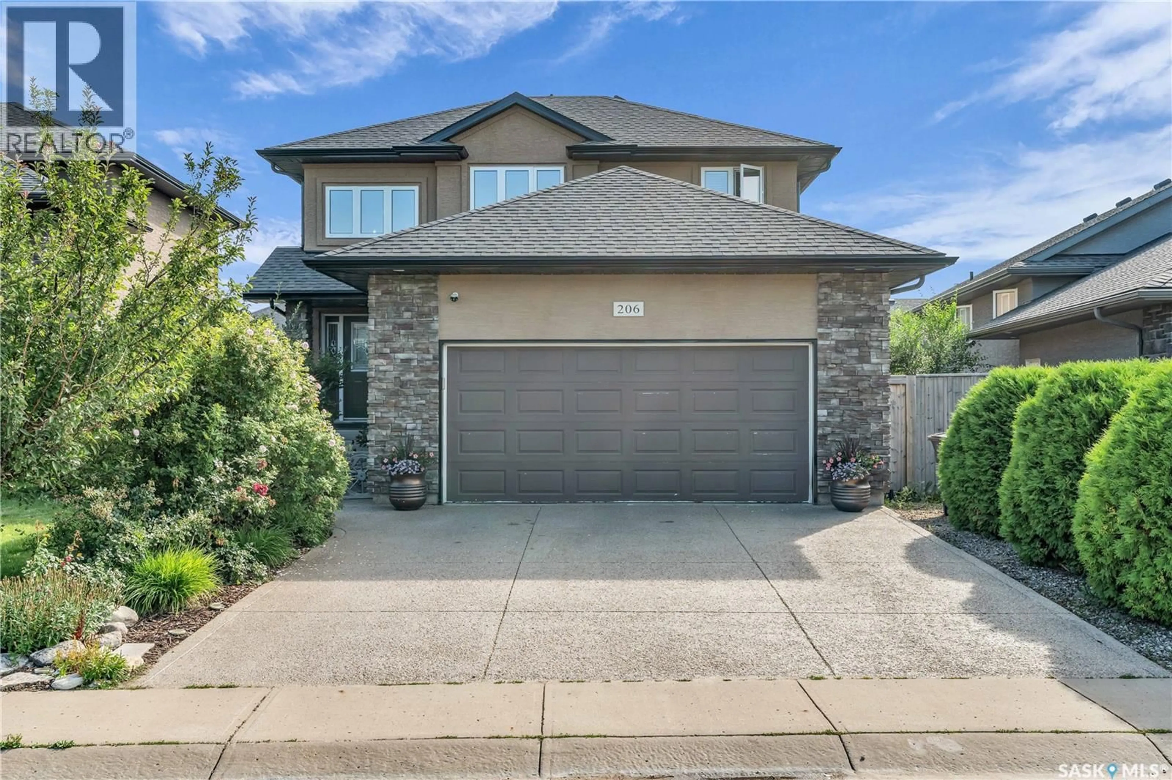 Home with brick exterior material, street for 206 WHALLEY CRESCENT, Saskatoon Saskatchewan S7T0E6