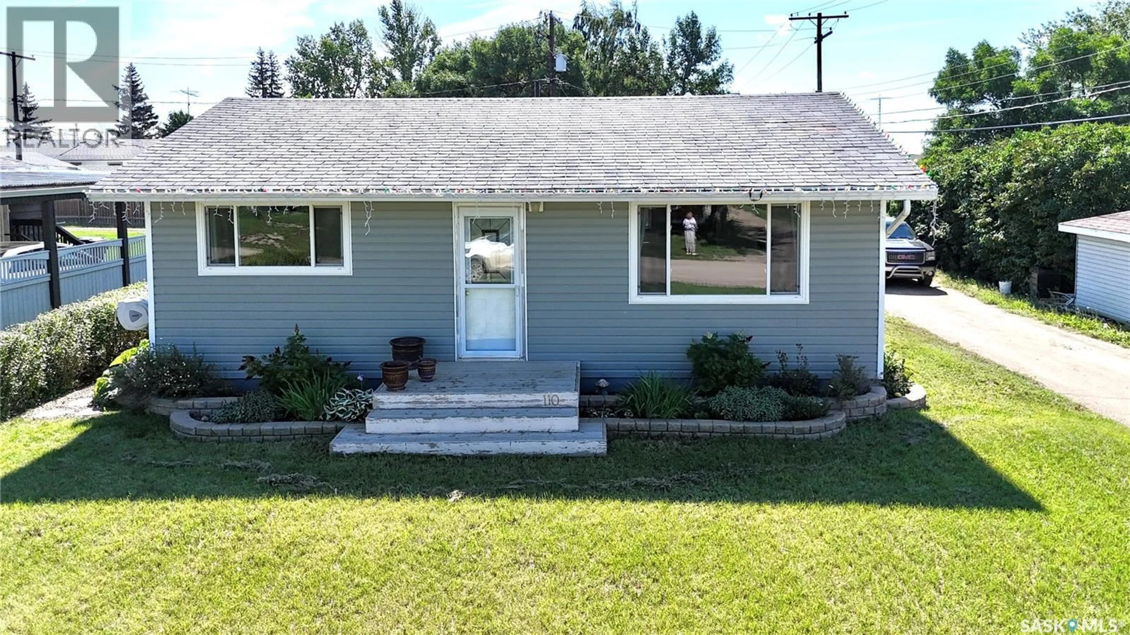Home with vinyl exterior material, street for 110 STANLEY STREET, Elbow Saskatchewan S0H1J0