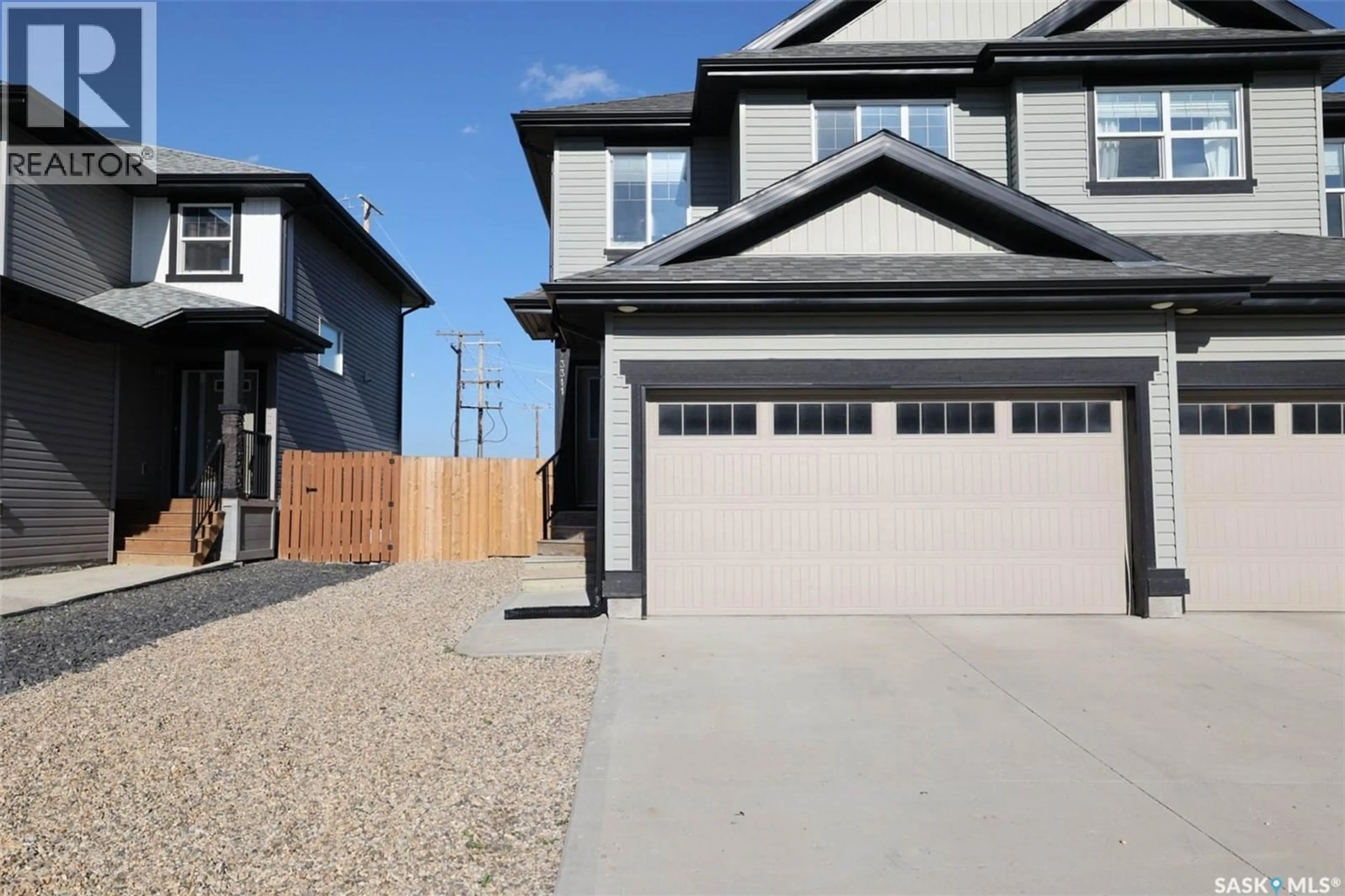 Home with vinyl exterior material, street for 3311 GREEN TURTLE ROAD, Regina Saskatchewan S4V3N6