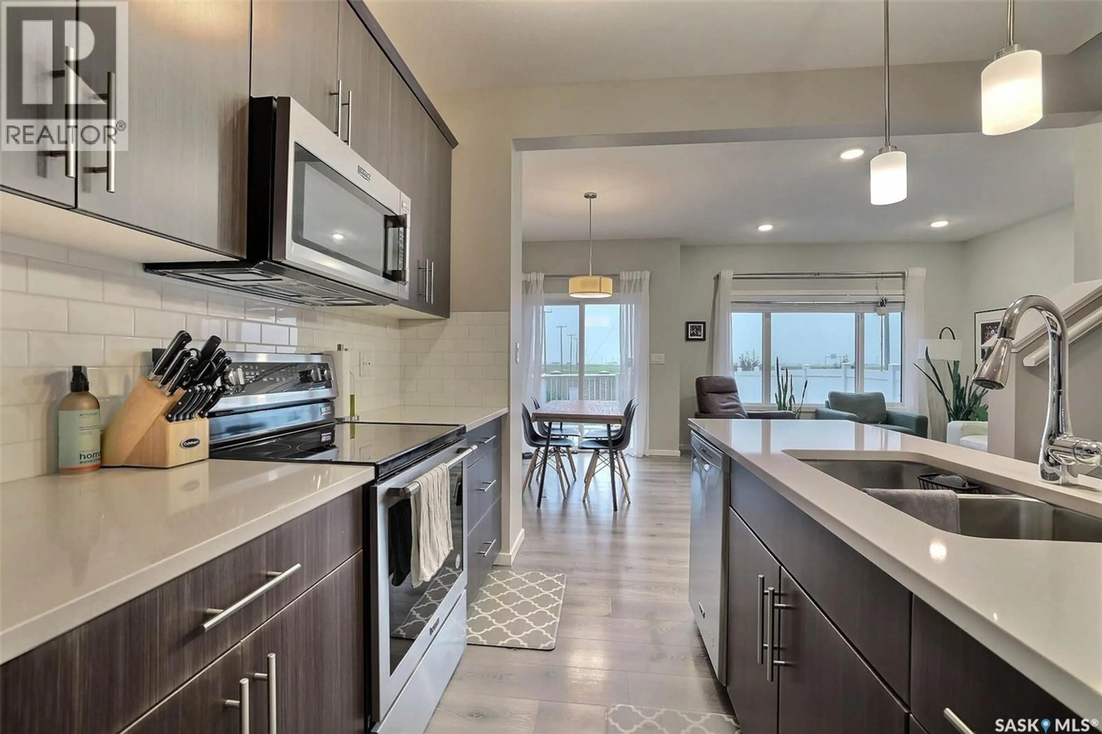Open concept kitchen, ceramic/tile floor for 3311 GREEN TURTLE ROAD, Regina Saskatchewan S4V3N6
