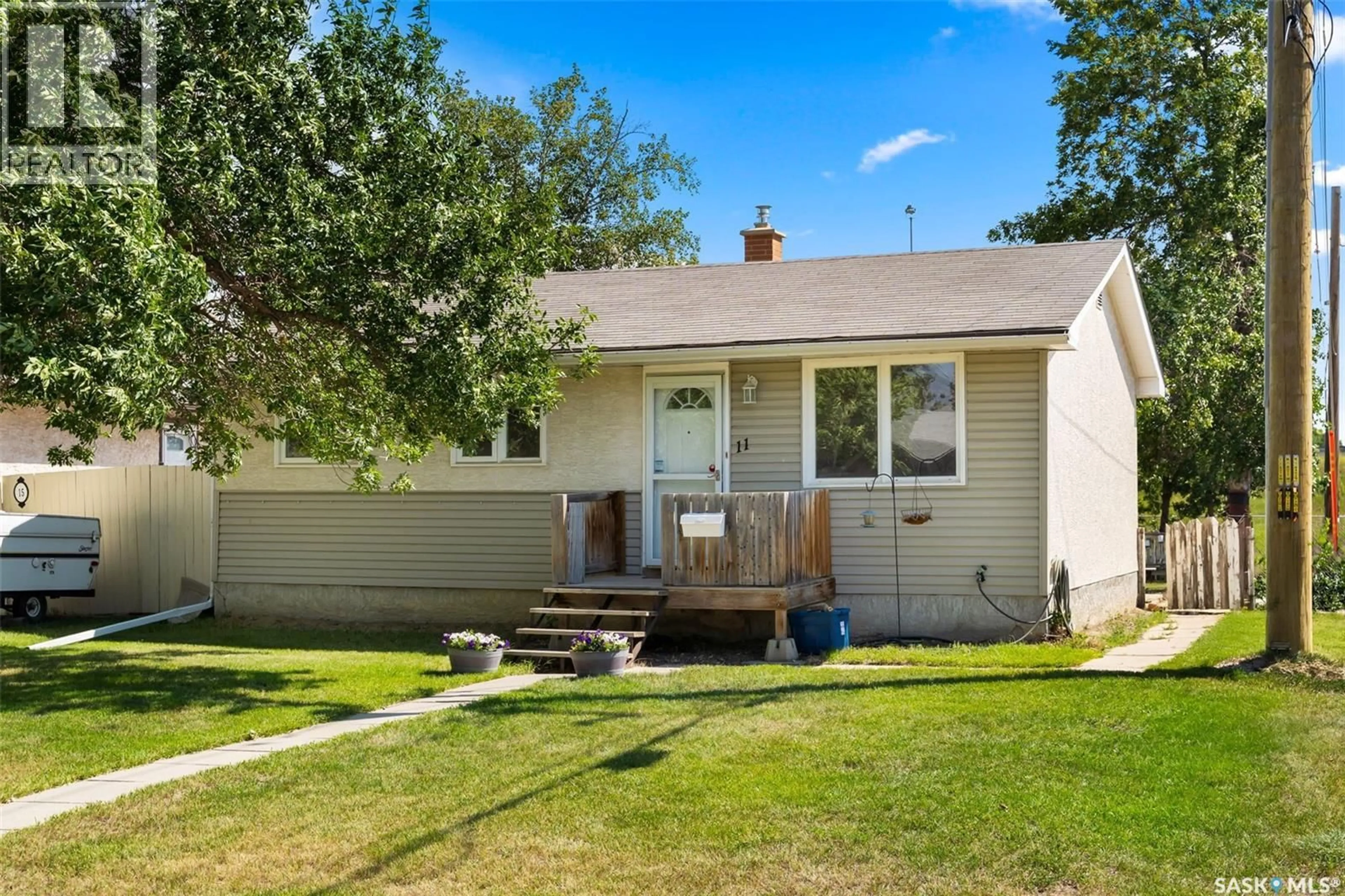 Home with vinyl exterior material, street for 11 ROTHWELL CRESCENT, Regina Saskatchewan S4N1R5