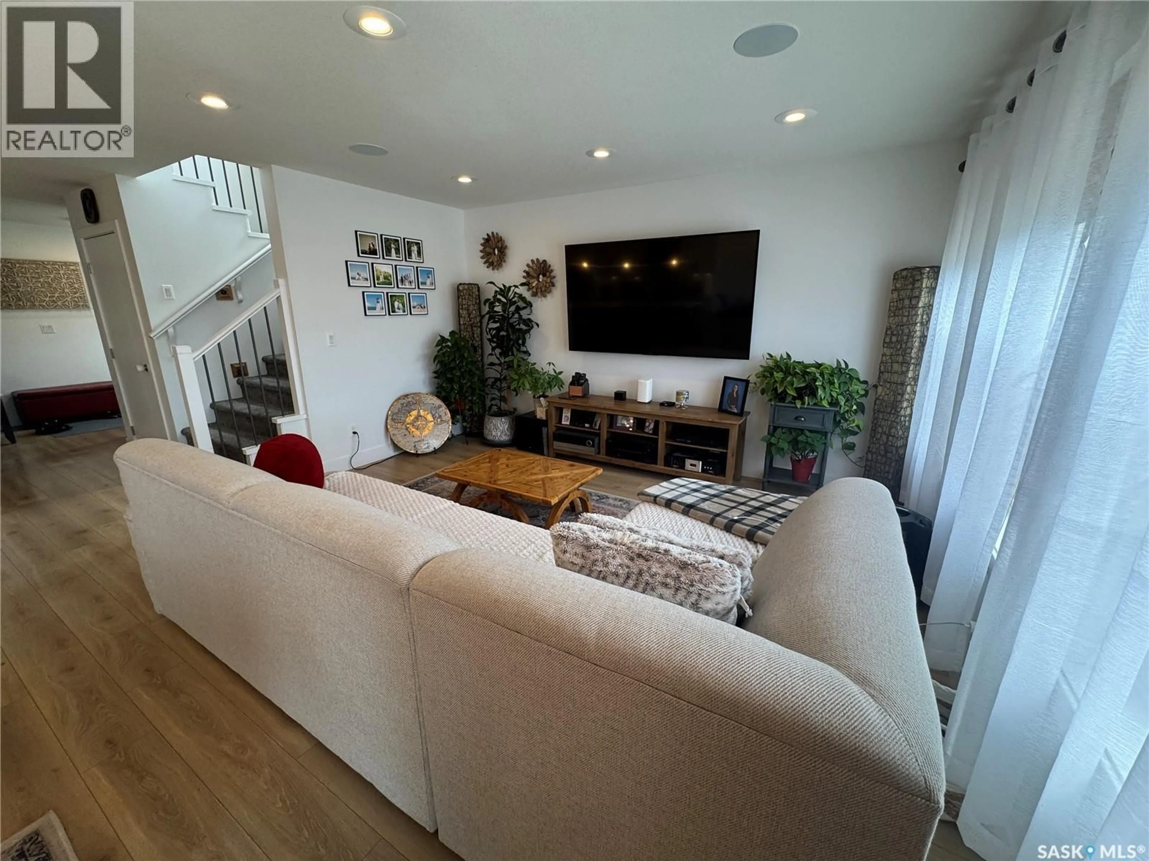 Living room with furniture, unknown for 103 STROMBERG CRESCENT, Saskatoon Saskatchewan S7L7C4