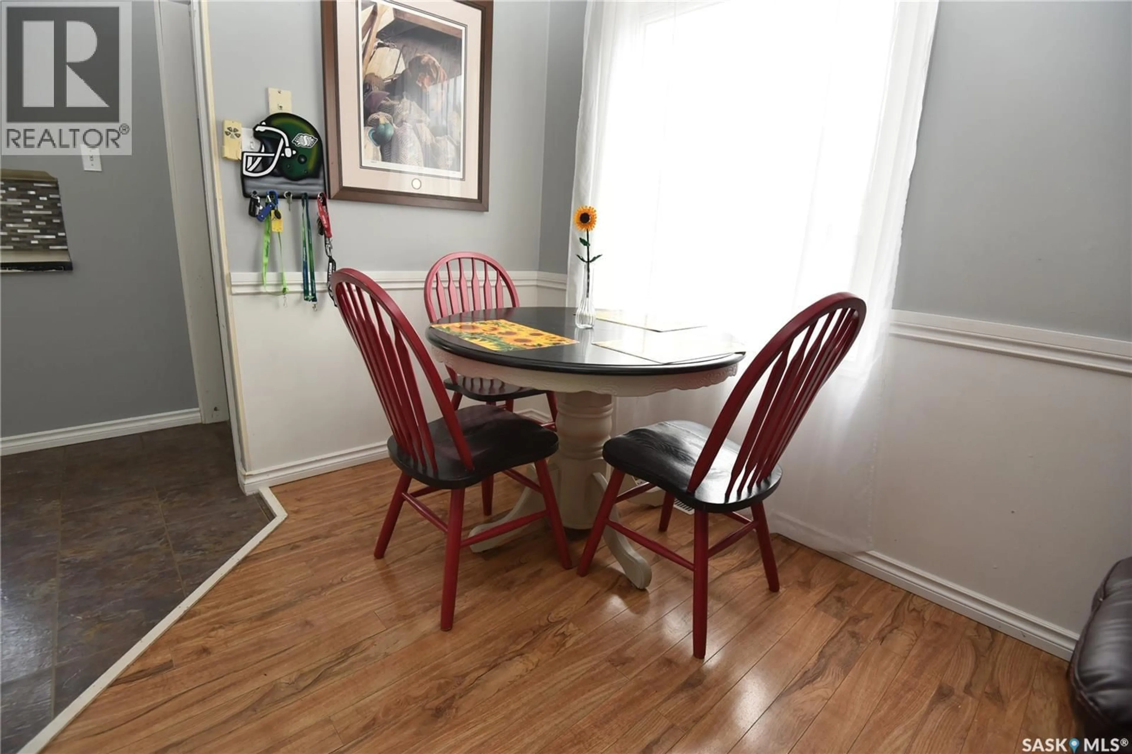 Dining room, wood/laminate floor for 415 8TH AVENUE, Nipawin Saskatchewan S0E1E0