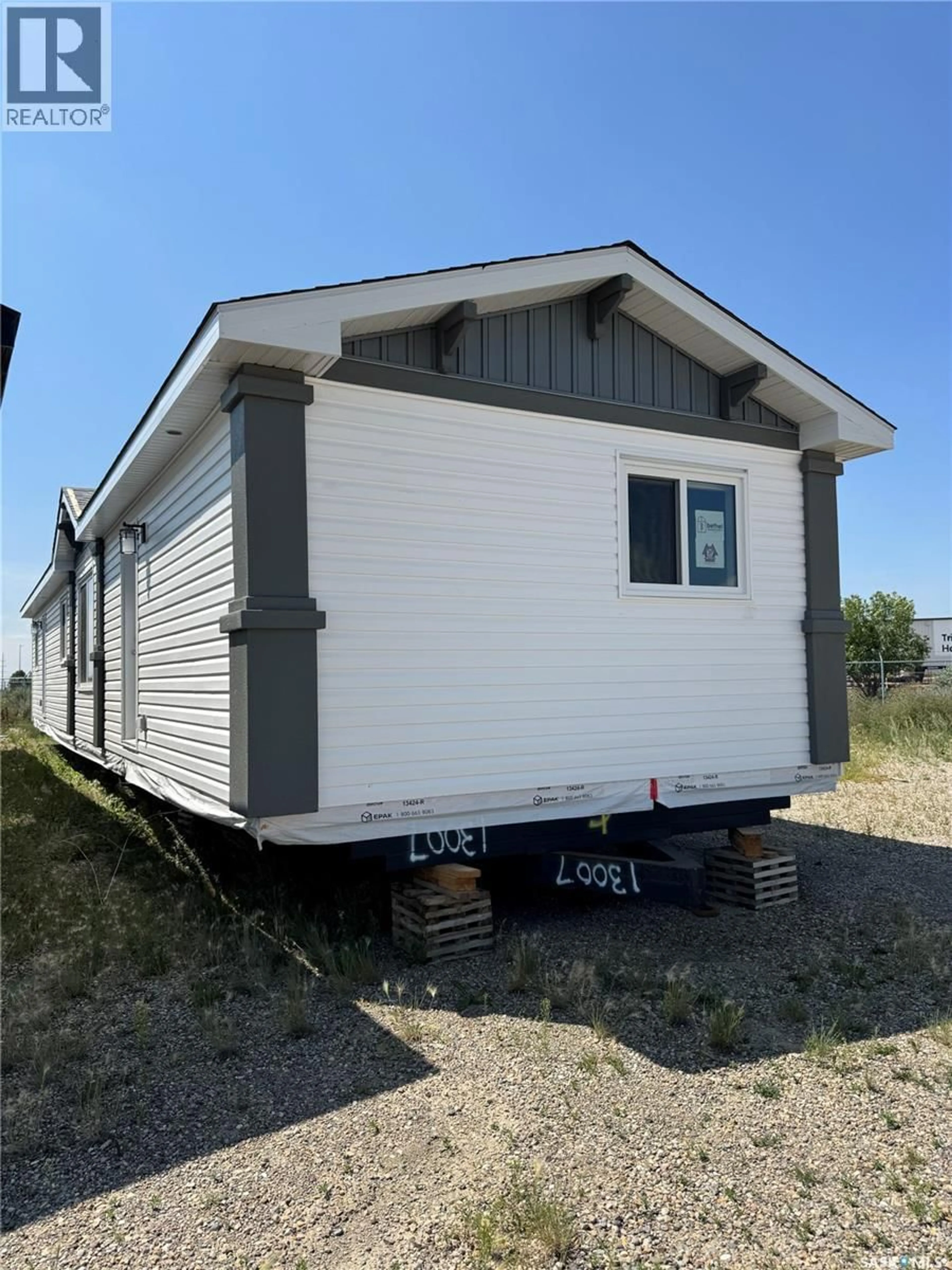 Home with vinyl exterior material, building for 1524 - 605 RAYNER AVENUE, Saskatoon Saskatchewan S7N2P8