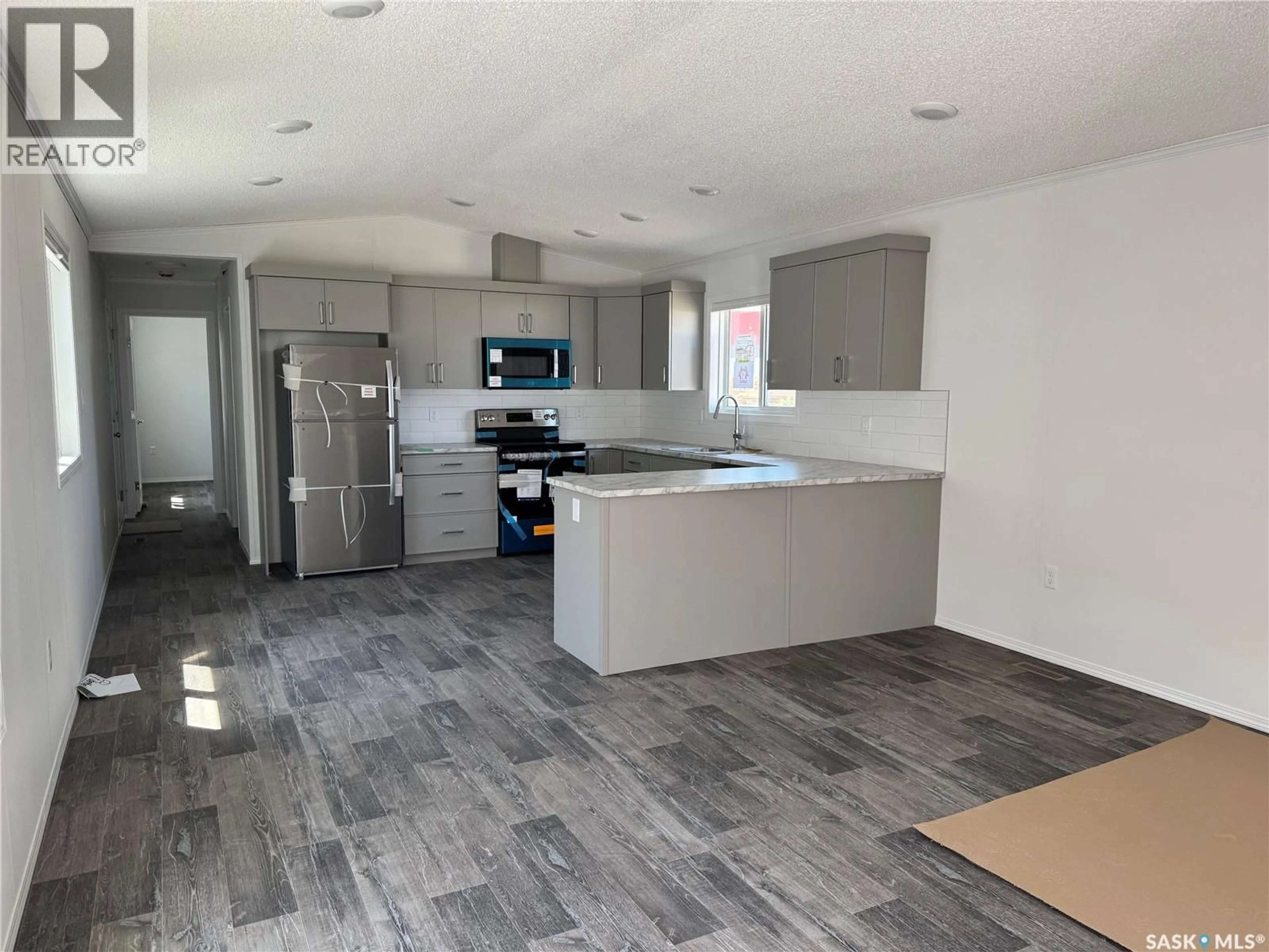 Open concept kitchen, unknown for 1524 - 605 RAYNER AVENUE, Saskatoon Saskatchewan S7N2P8