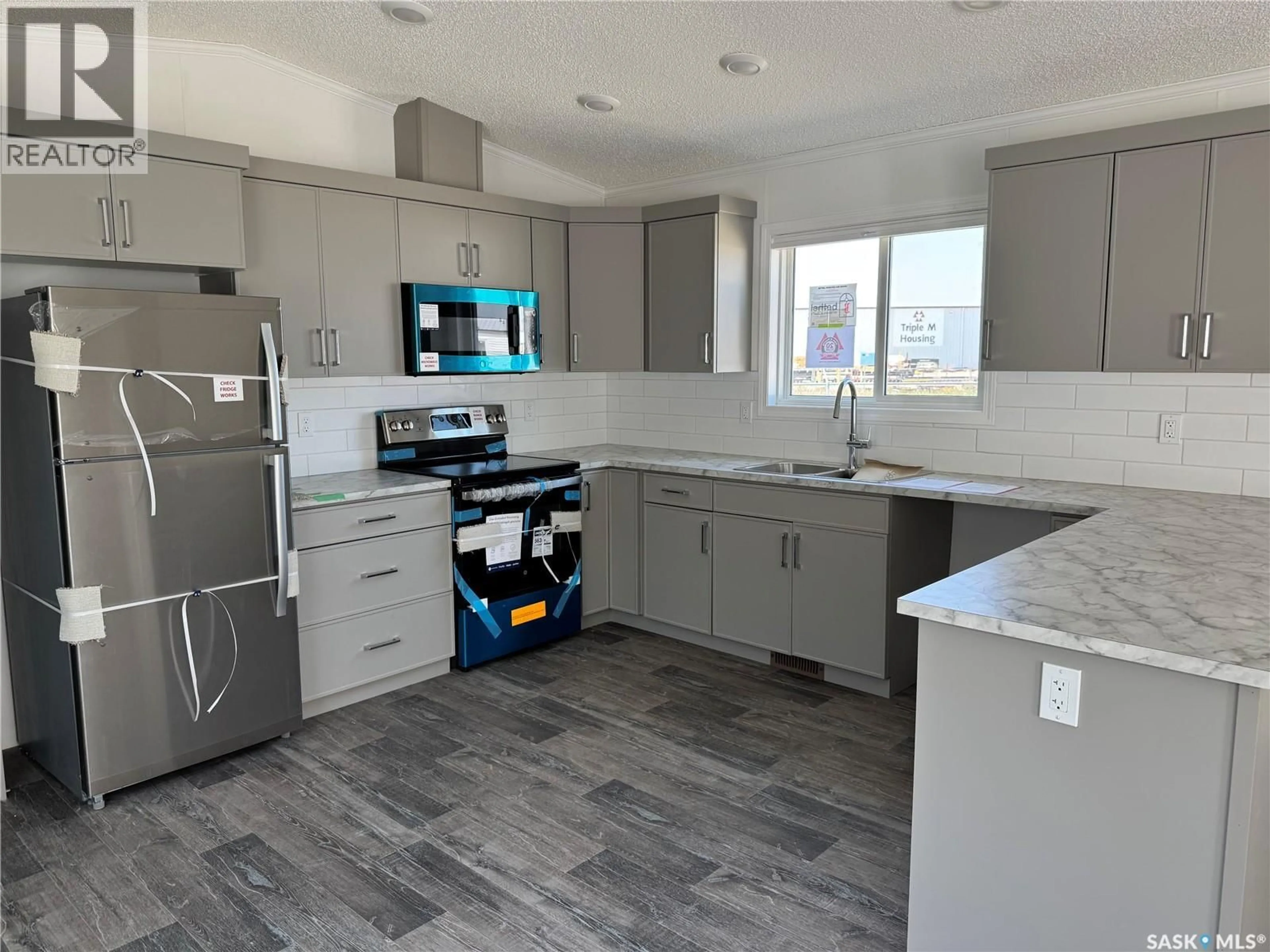 Open concept kitchen, unknown for 1524 - 605 RAYNER AVENUE, Saskatoon Saskatchewan S7N2P8