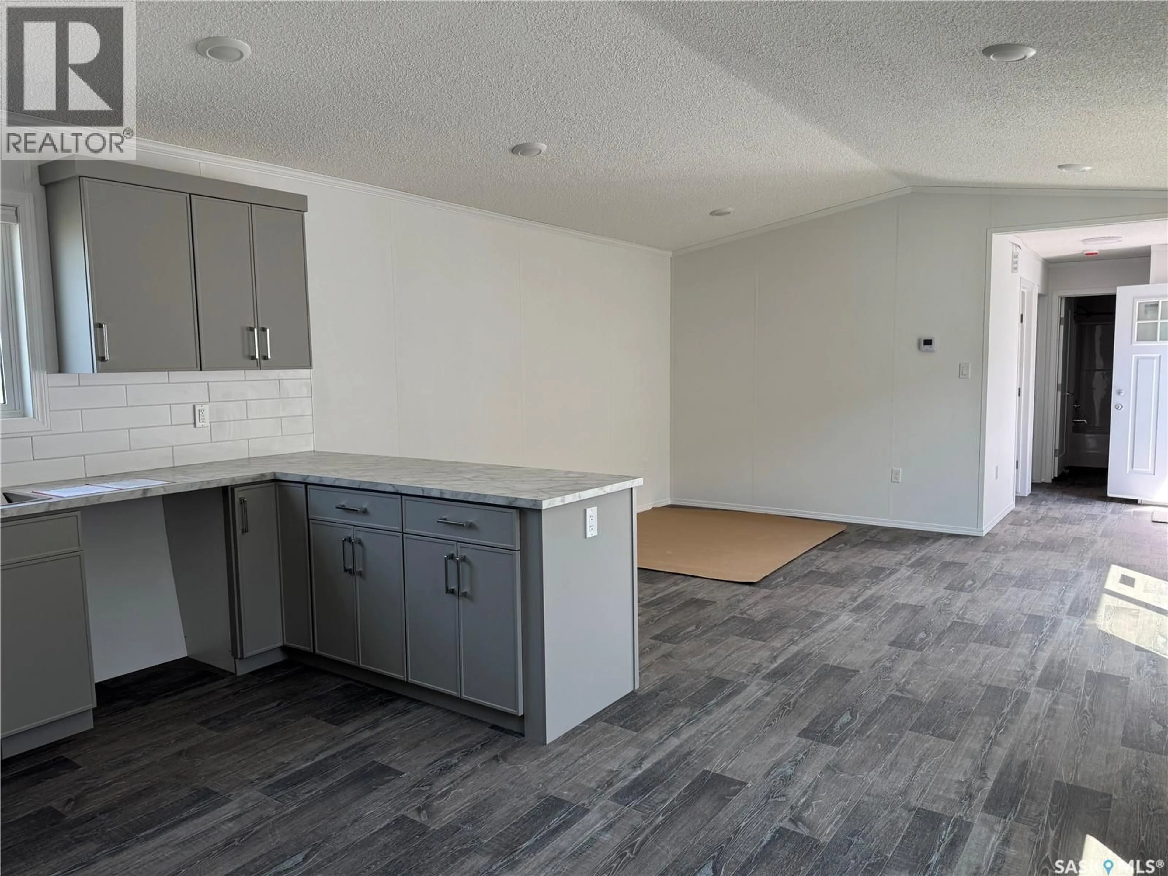 Open concept kitchen, unknown for 1524 - 605 RAYNER AVENUE, Saskatoon Saskatchewan S7N2P8