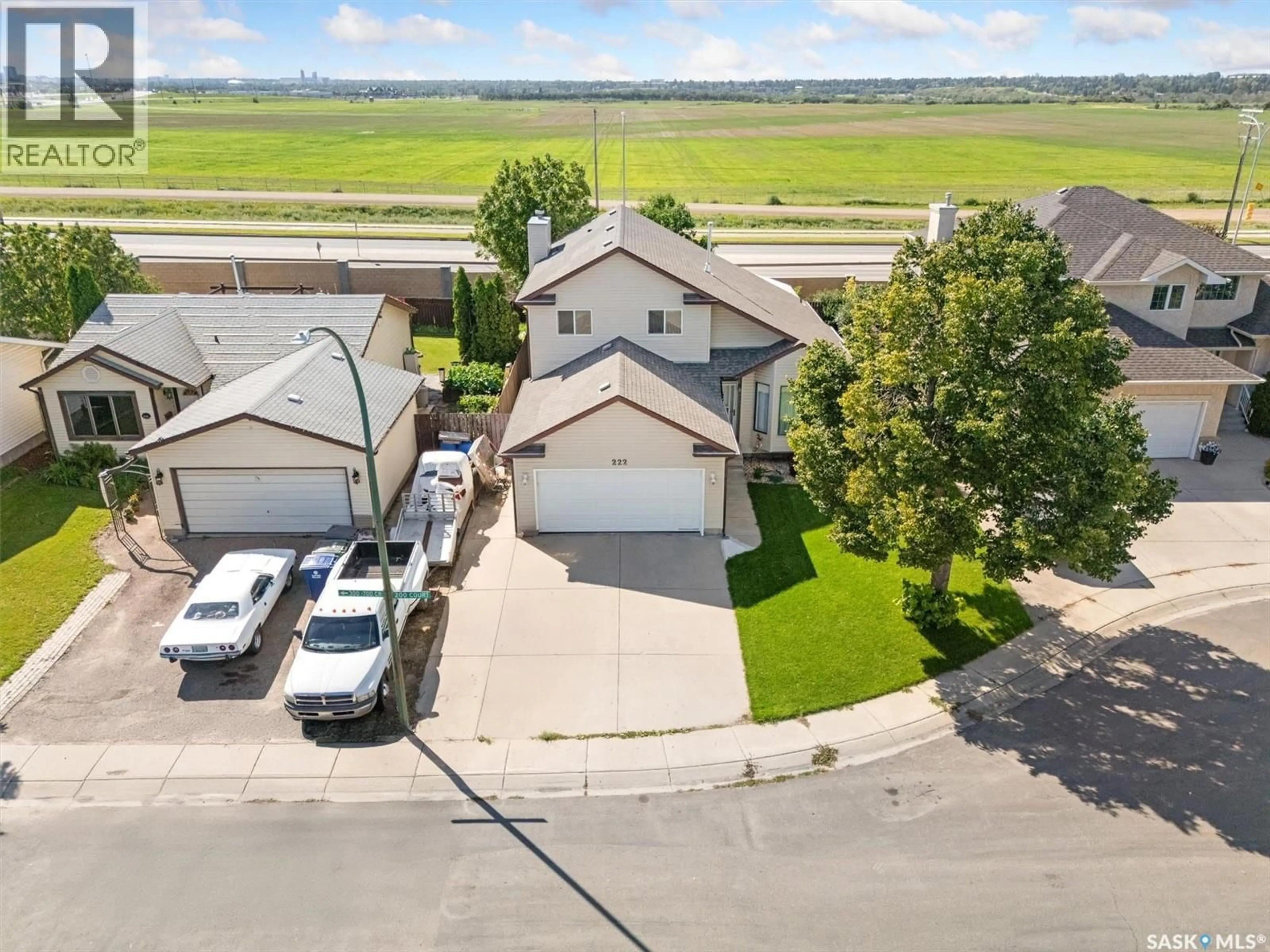 A pic from outside/outdoor area/front of a property/back of a property/a pic from drone, street for 222 HASLAM COURT, Saskatoon Saskatchewan S7S1E3