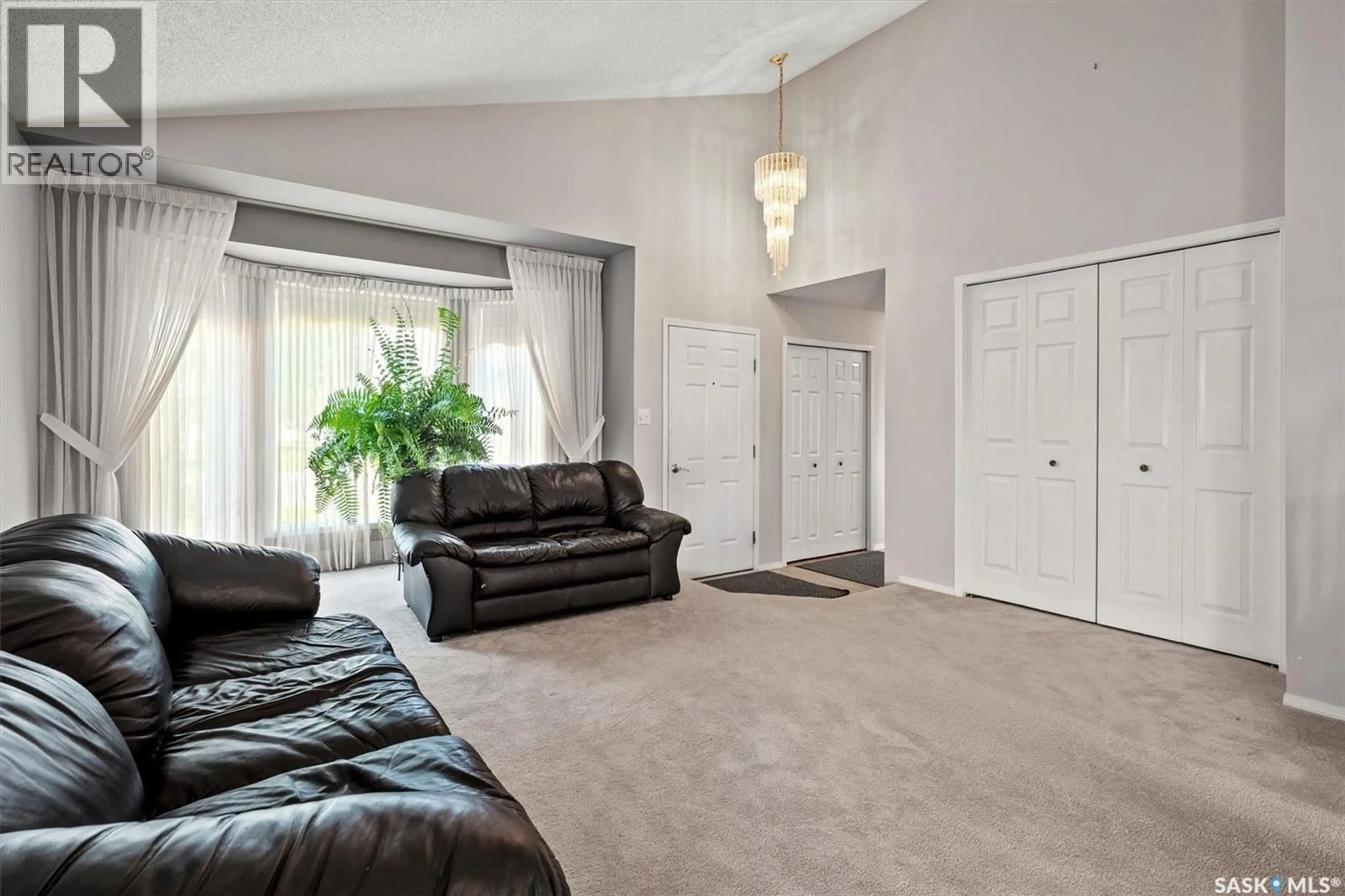 Living room with furniture, unknown for 222 HASLAM COURT, Saskatoon Saskatchewan S7S1E3