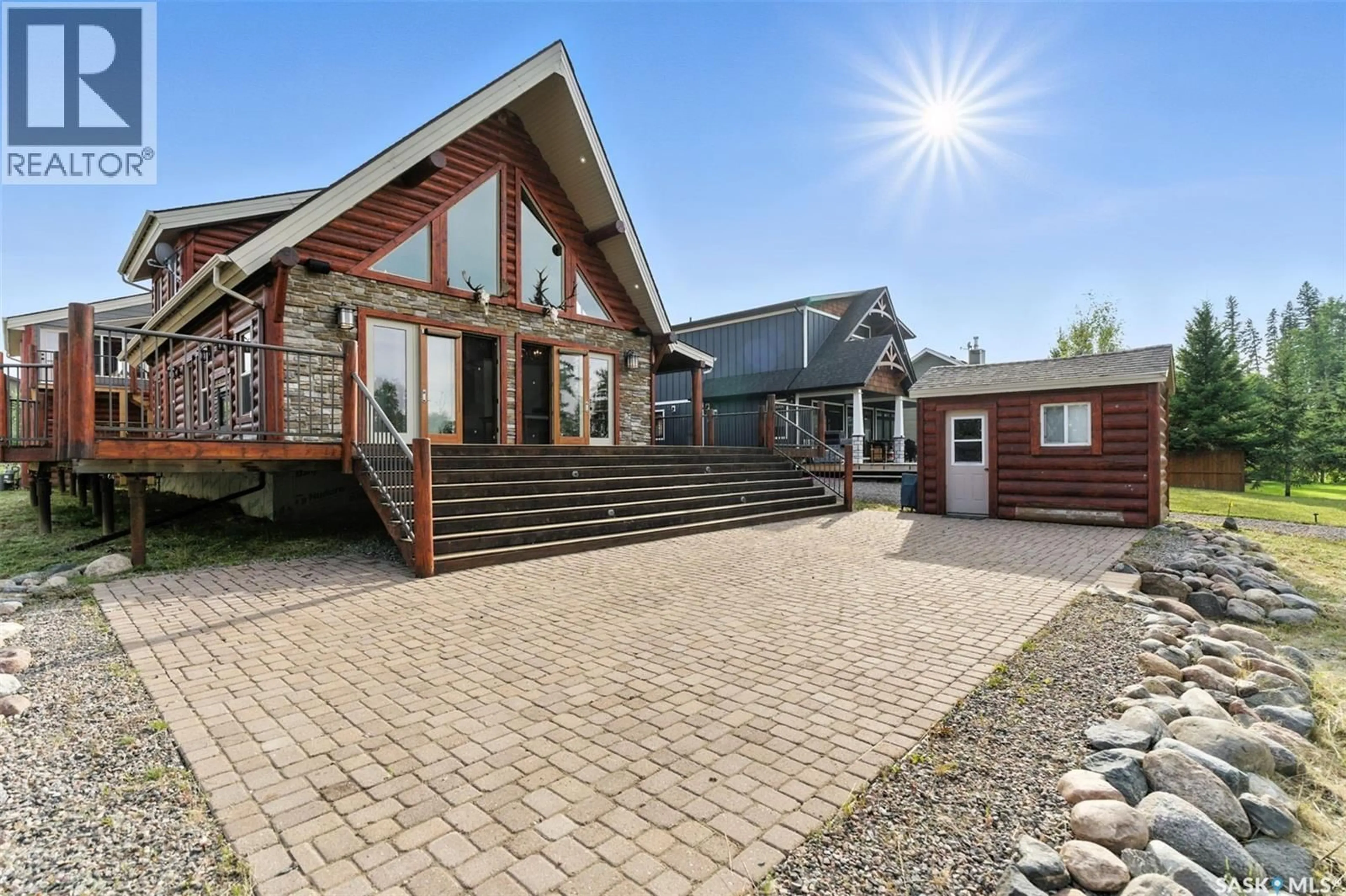 A pic from outside/outdoor area/front of a property/back of a property/a pic from drone, unknown for 13 ISLANDER DRIVE, Candle Lake Saskatchewan S0J3E0