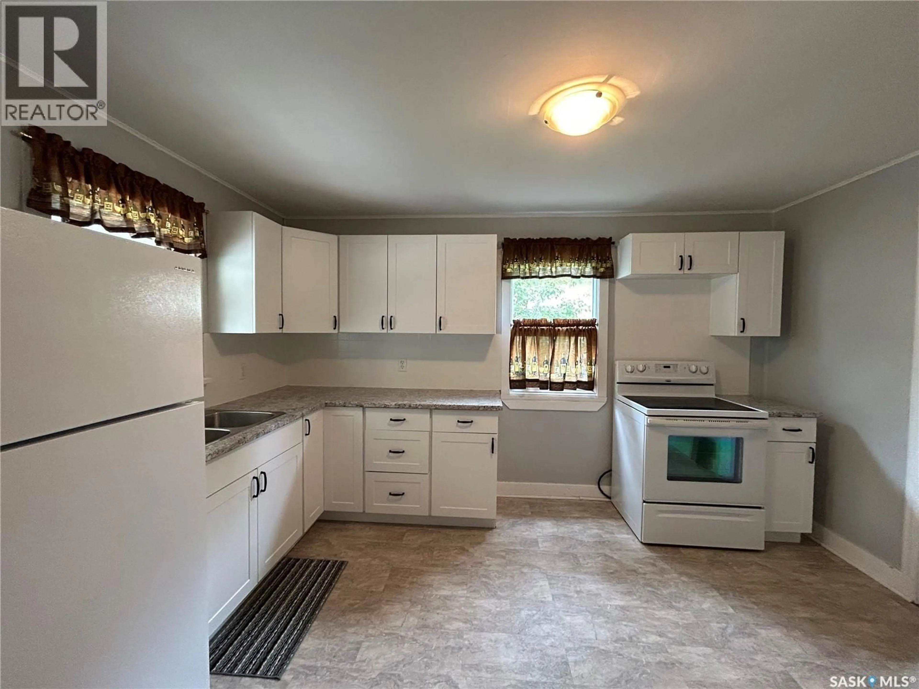 Standard kitchen, ceramic/tile floor for 740 7TH STREET, Humboldt Saskatchewan S0K2A0