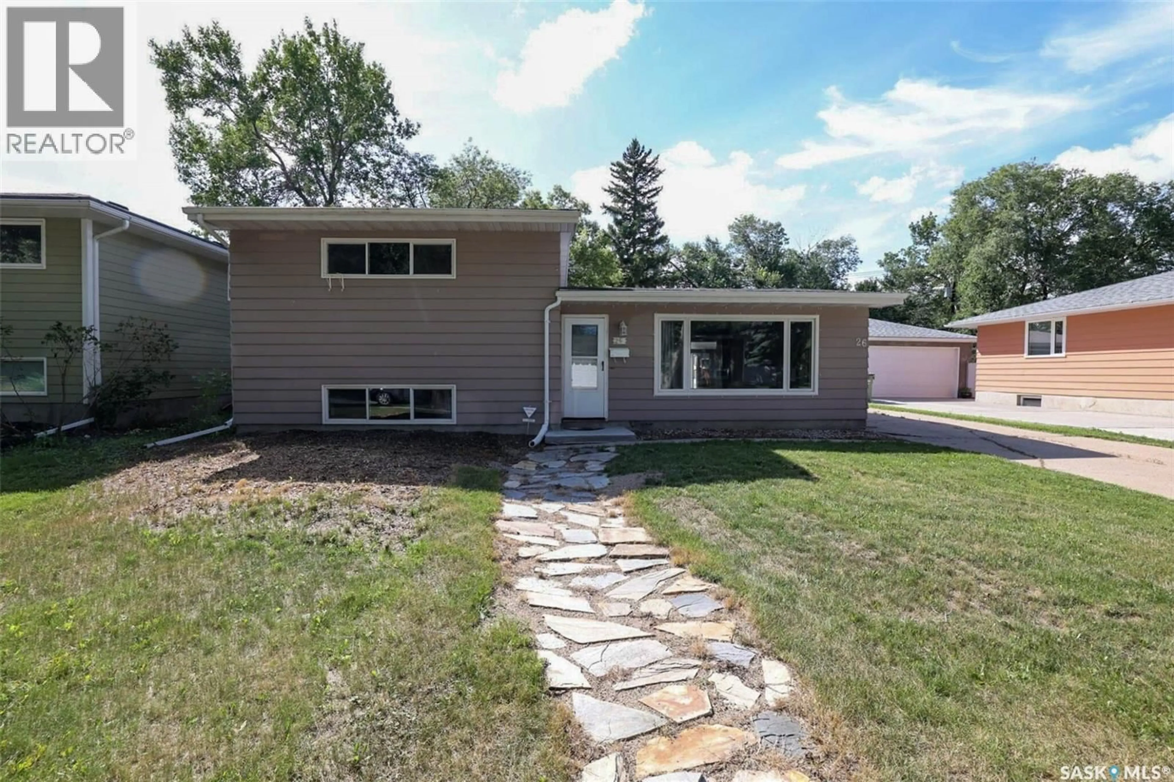 Home with vinyl exterior material, street for 26 NEWLANDS STREET, Regina Saskatchewan S4S4S4