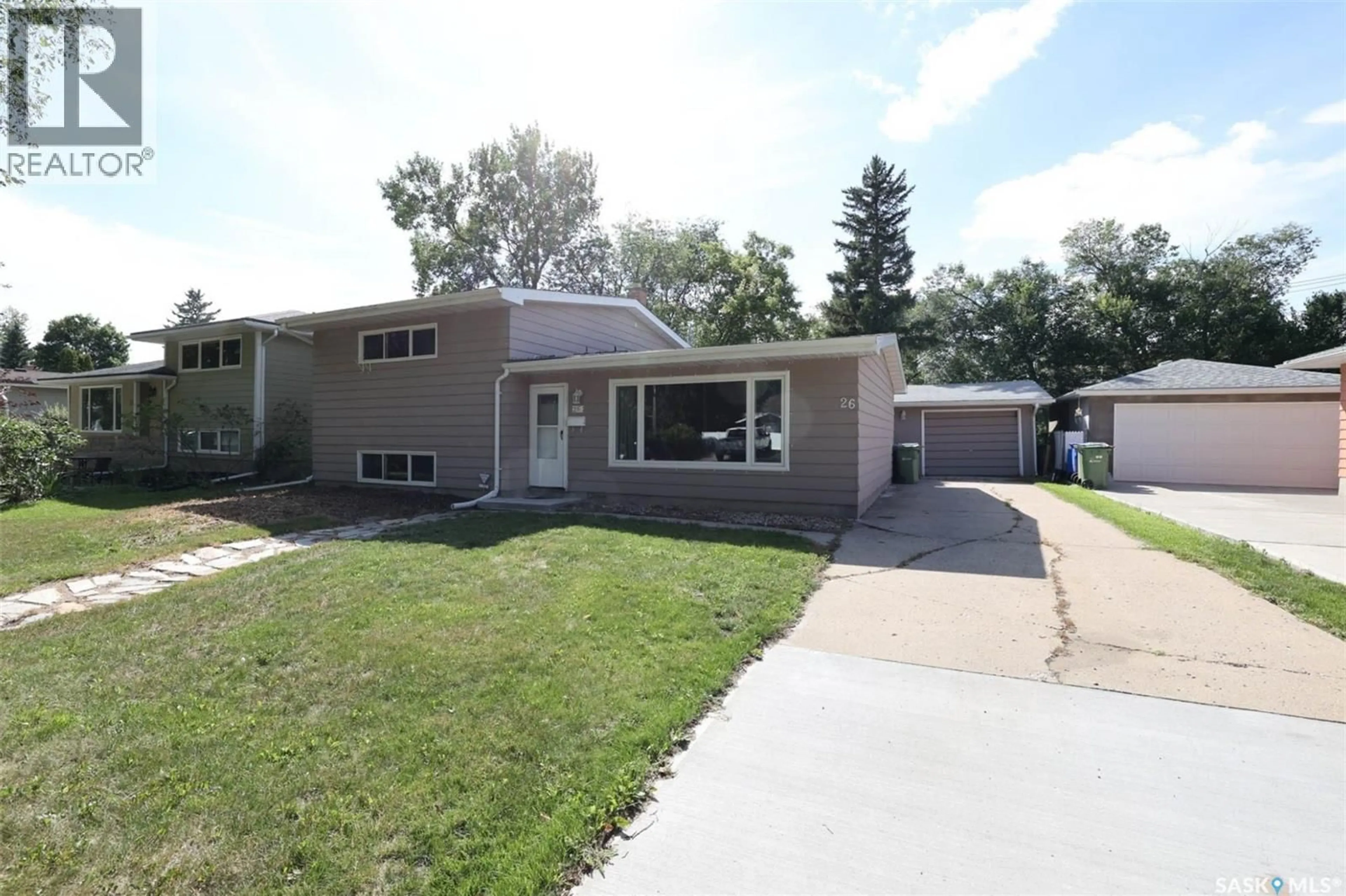 Home with vinyl exterior material, street for 26 NEWLANDS STREET, Regina Saskatchewan S4S4S4