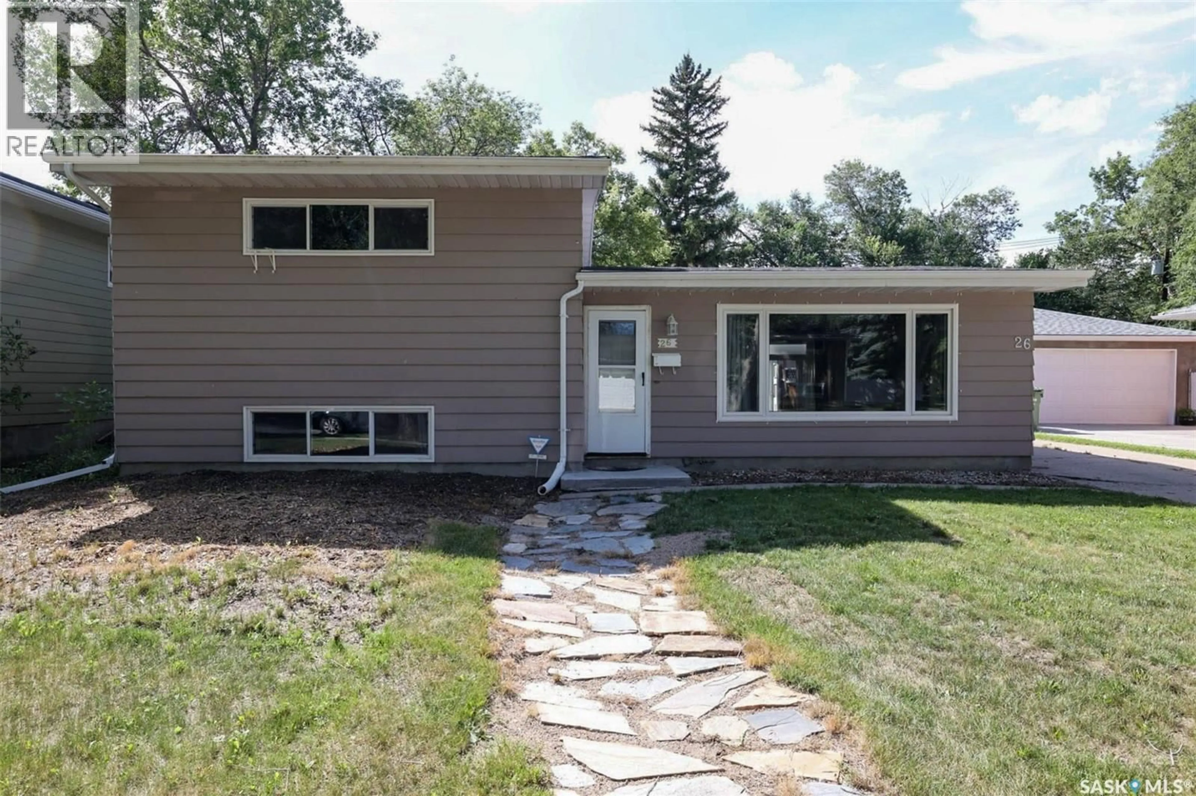 Home with vinyl exterior material, street for 26 NEWLANDS STREET, Regina Saskatchewan S4S4S4