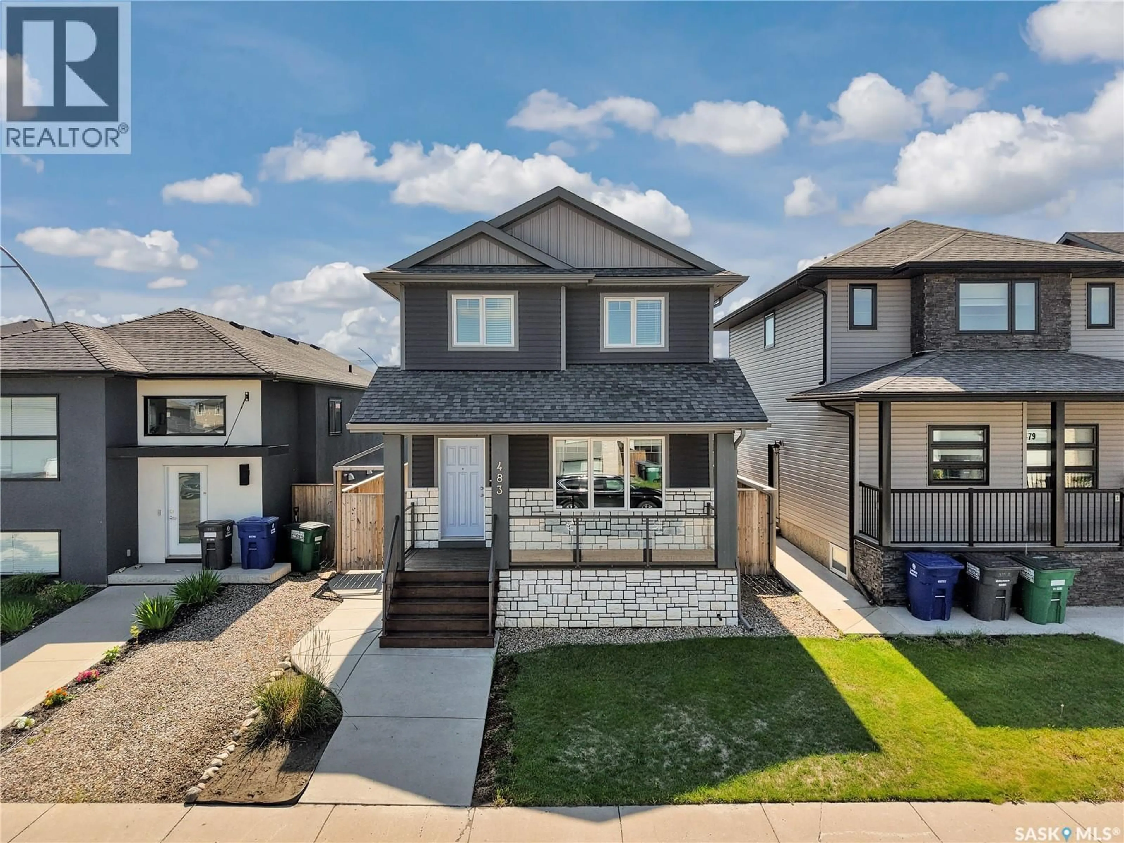 Home with vinyl exterior material, street for 483 KLOPPENBURG STREET, Saskatoon Saskatchewan S7W0N8