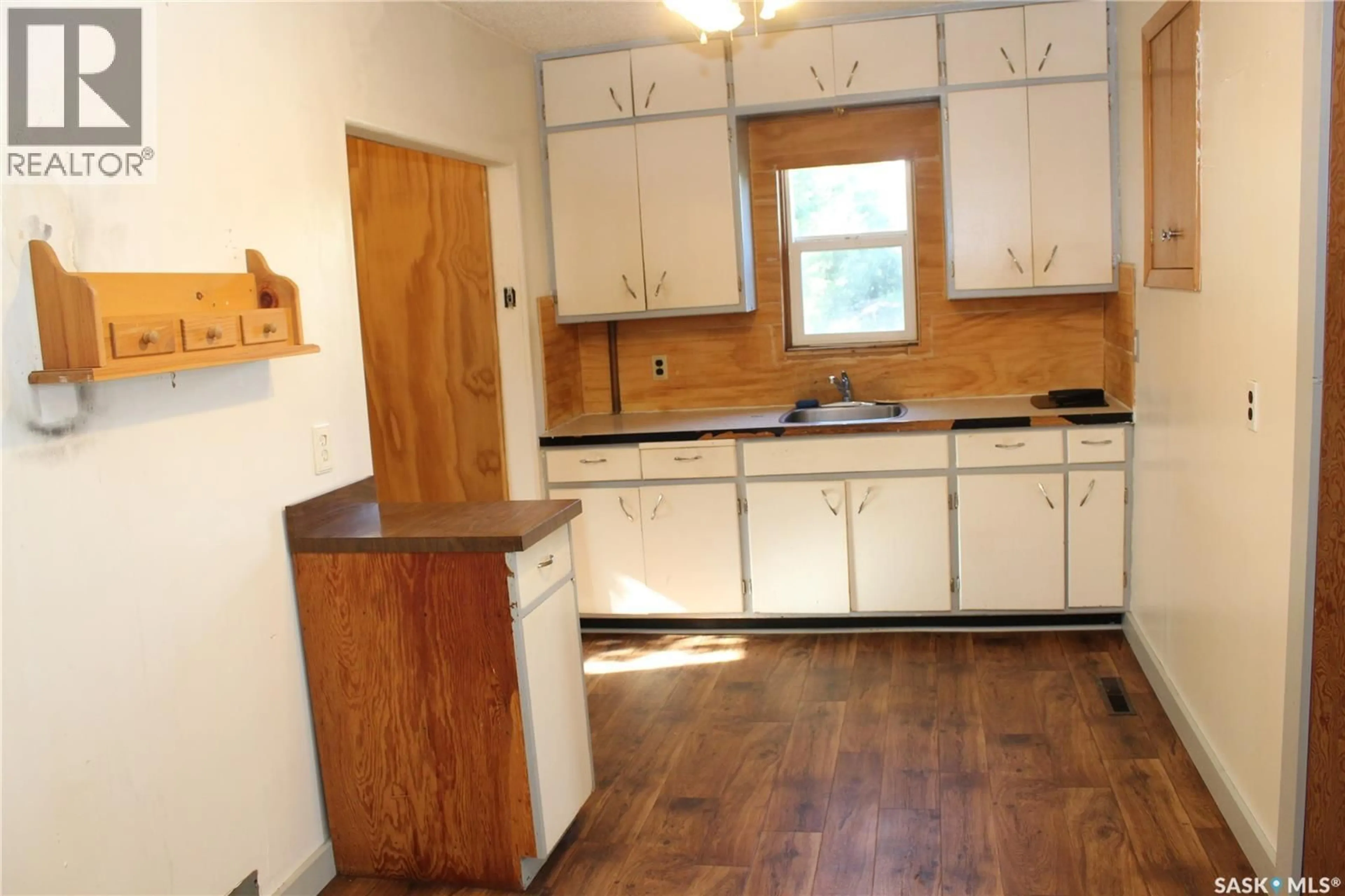 Standard kitchen, wood/laminate floor for 707 KING STREET, Cudworth Saskatchewan S0K1B0
