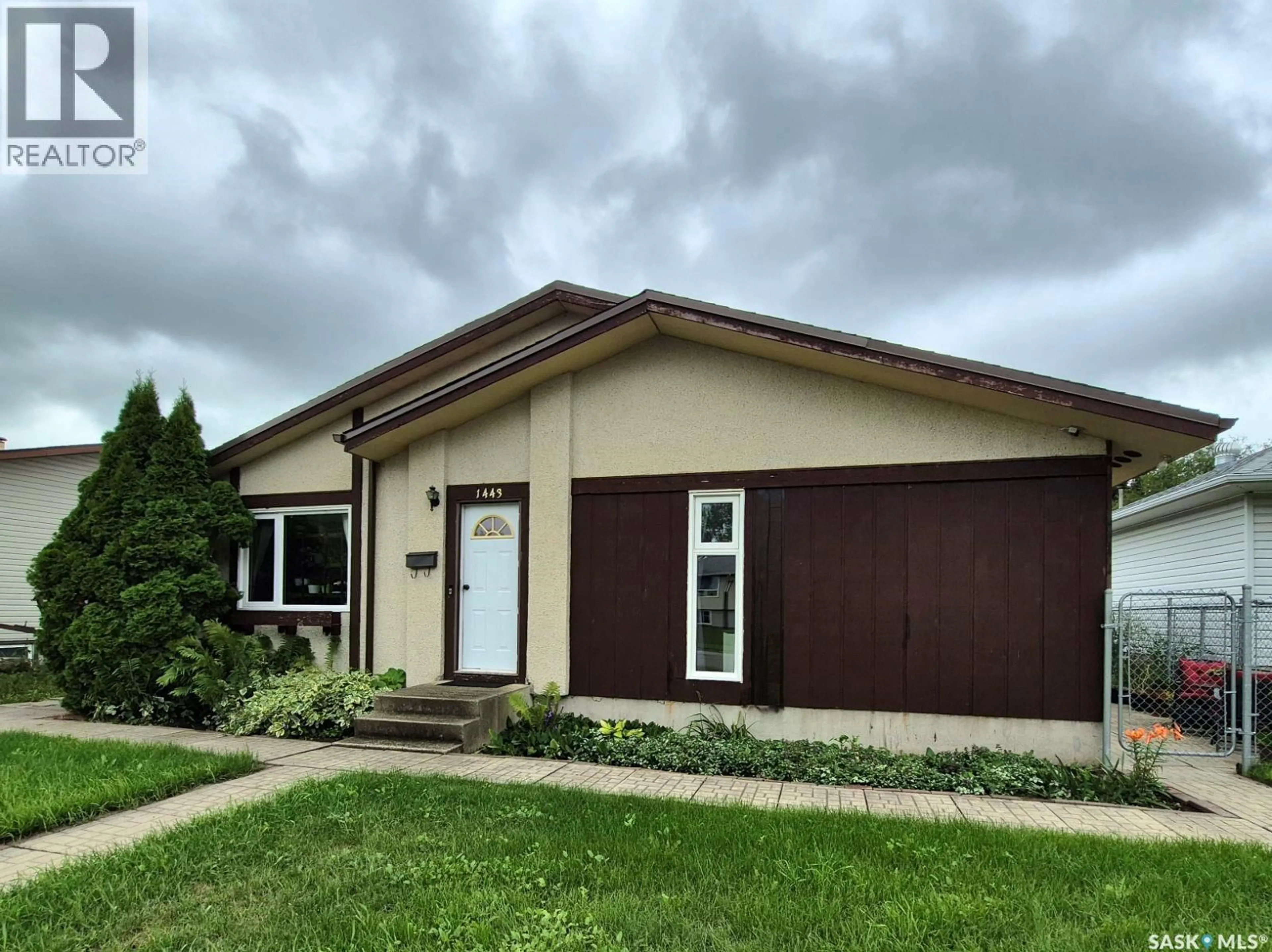 Home with vinyl exterior material, street for 1443 4TH STREET, Prince Albert Saskatchewan S6V0L7