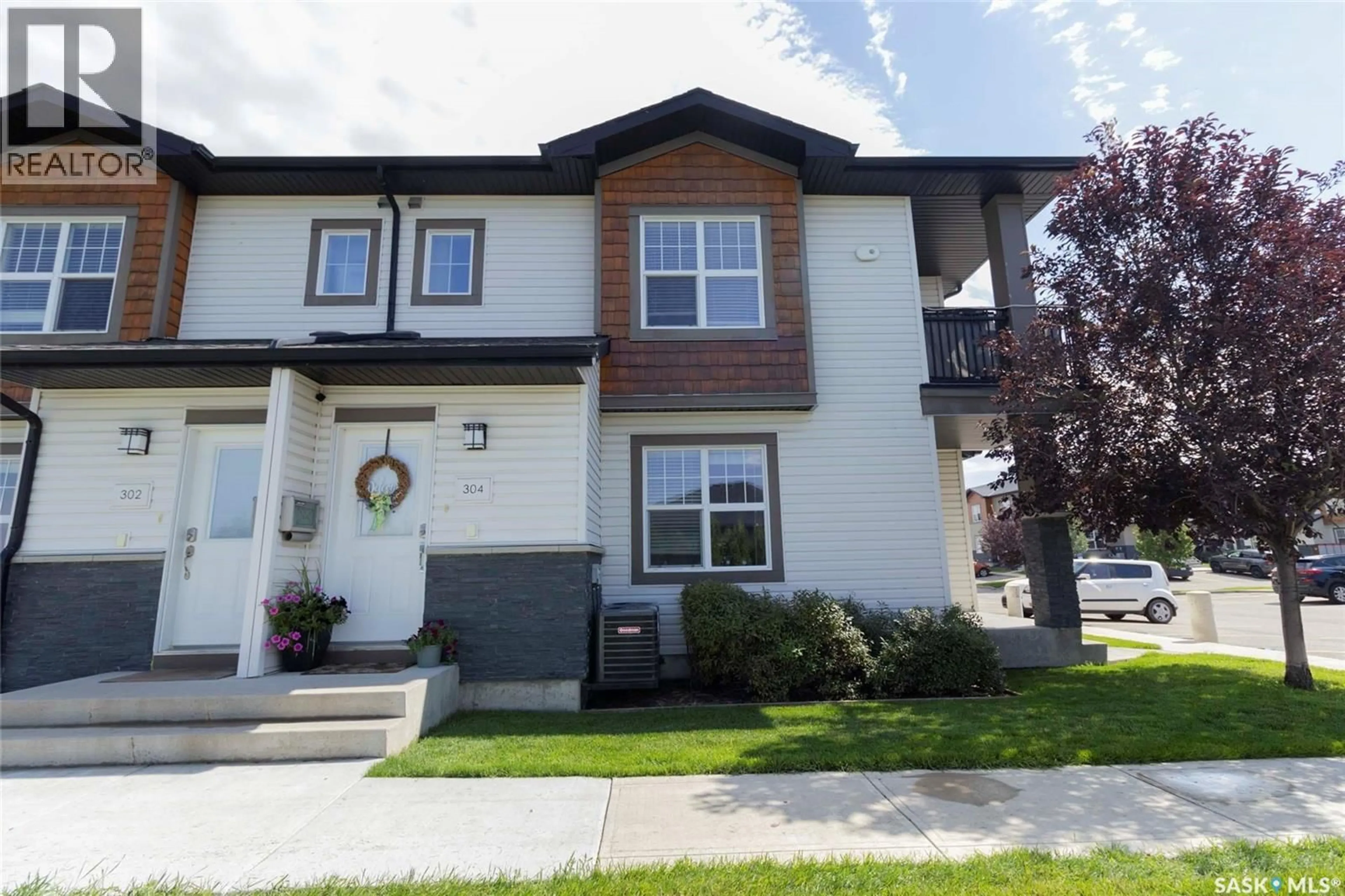 Home with vinyl exterior material, street for 1015 - 304 PATRICK CRESCENT, Saskatoon Saskatchewan S7M0M3